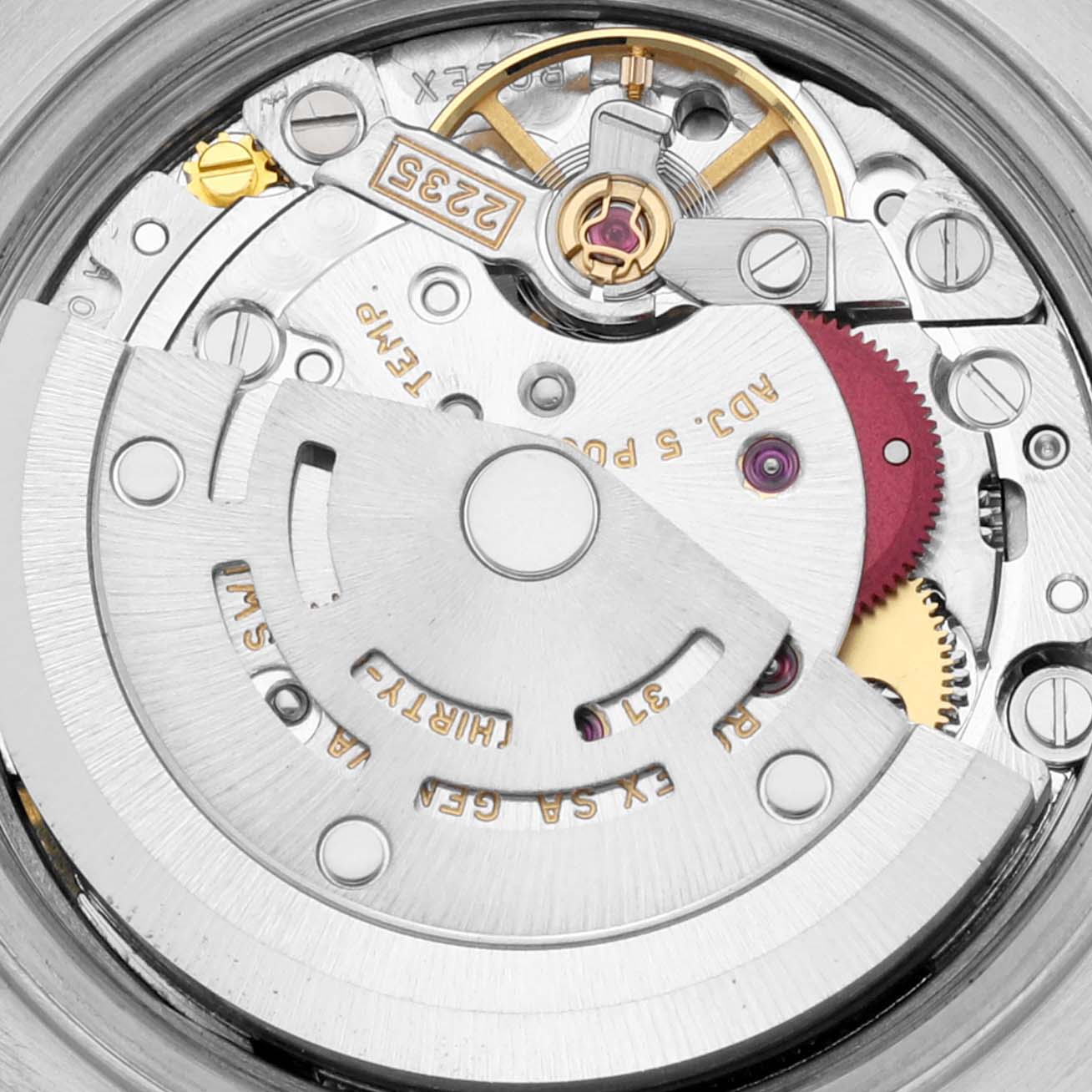 This image shows a close-up of the movement mechanism of a Rolex Datejust 79173 Women's Steel and Gold (two tone) Blue Dial 79173 Women's Steel and Gold (two tone) Blue Dial watch, including gears and the rotor.