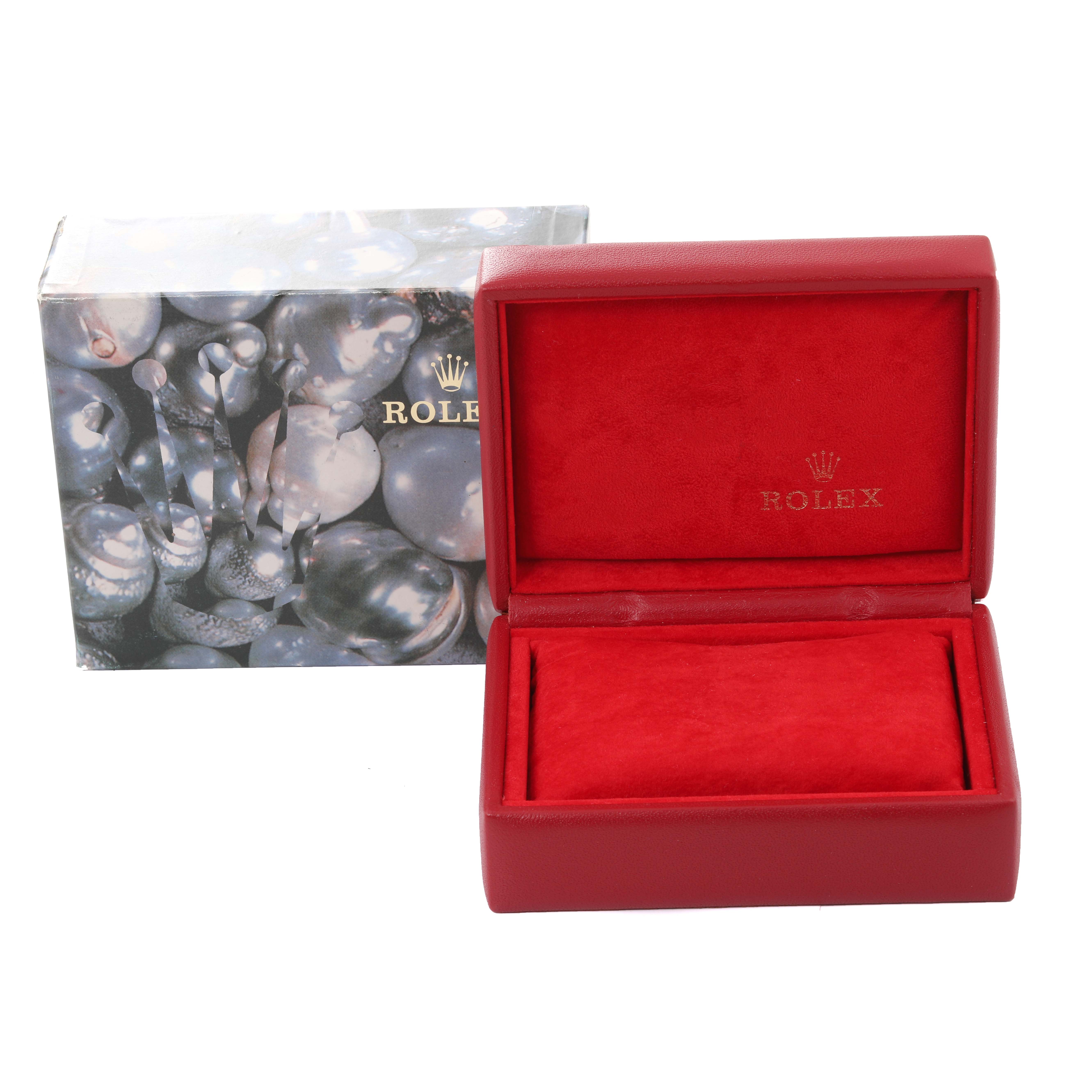 The image shows a red Rolex Datejust 79173 Women's Steel and Gold (two tone) Blue Dial 79173 Women's Steel and Gold (two tone) Blue Dial watch box and an outer decorative box.