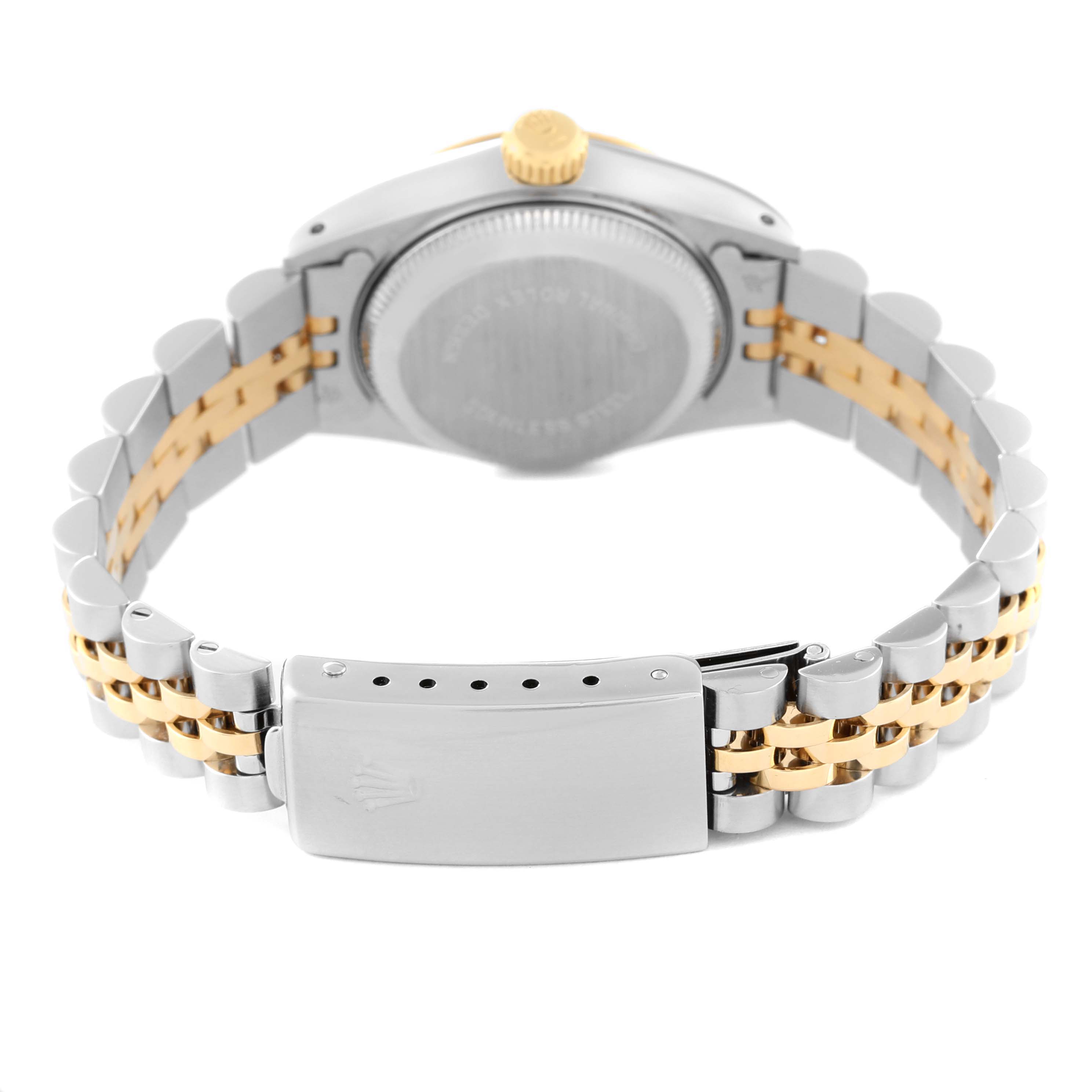 This image shows the back view of a Rolex Datejust 69173 Women's Steel and Gold (two tone) Champagne Dial 69173 Women's Steel and Gold (two tone) Champagne Dial watch, highlighting its two-tone bracelet and clasp.