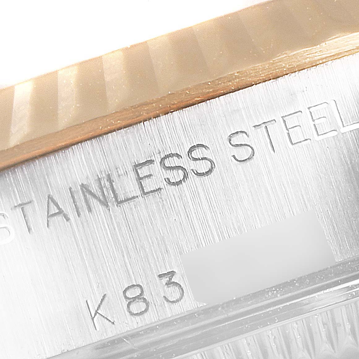 The image shows a close-up of the stainless steel case side and part of the bezel of a Rolex Datejust 79173 Women's Stainless Steel Champagne Dial 79173 Women's Stainless Steel Champagne Dial watch.