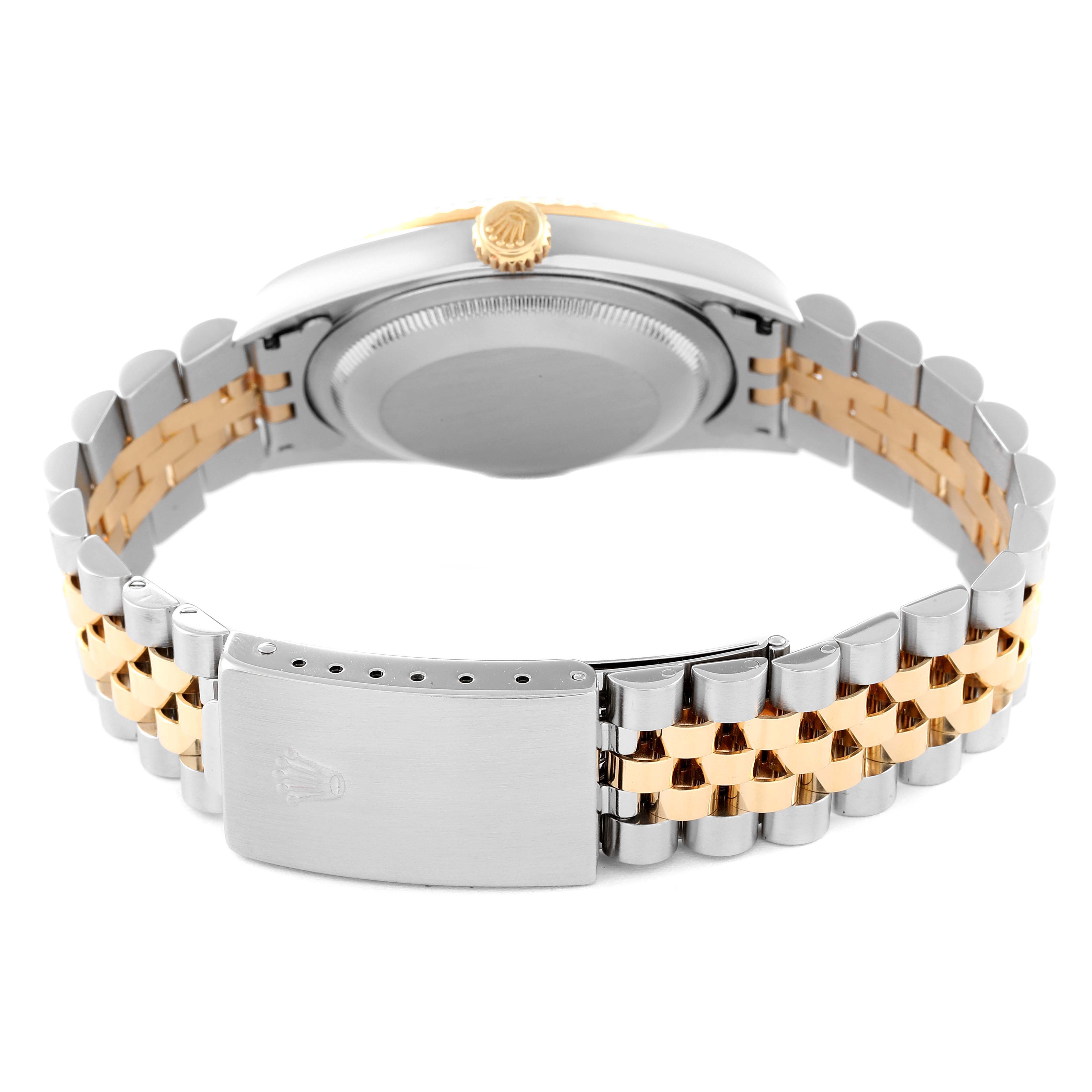 The image shows the back of a Rolex Datejust 16233 Men
s Steel and Gold (two tone) Grey Dial 16233 Men
s Steel and Gold (two tone) Grey Dial watch, highlighting its case back, crown, and two-tone bracelet.