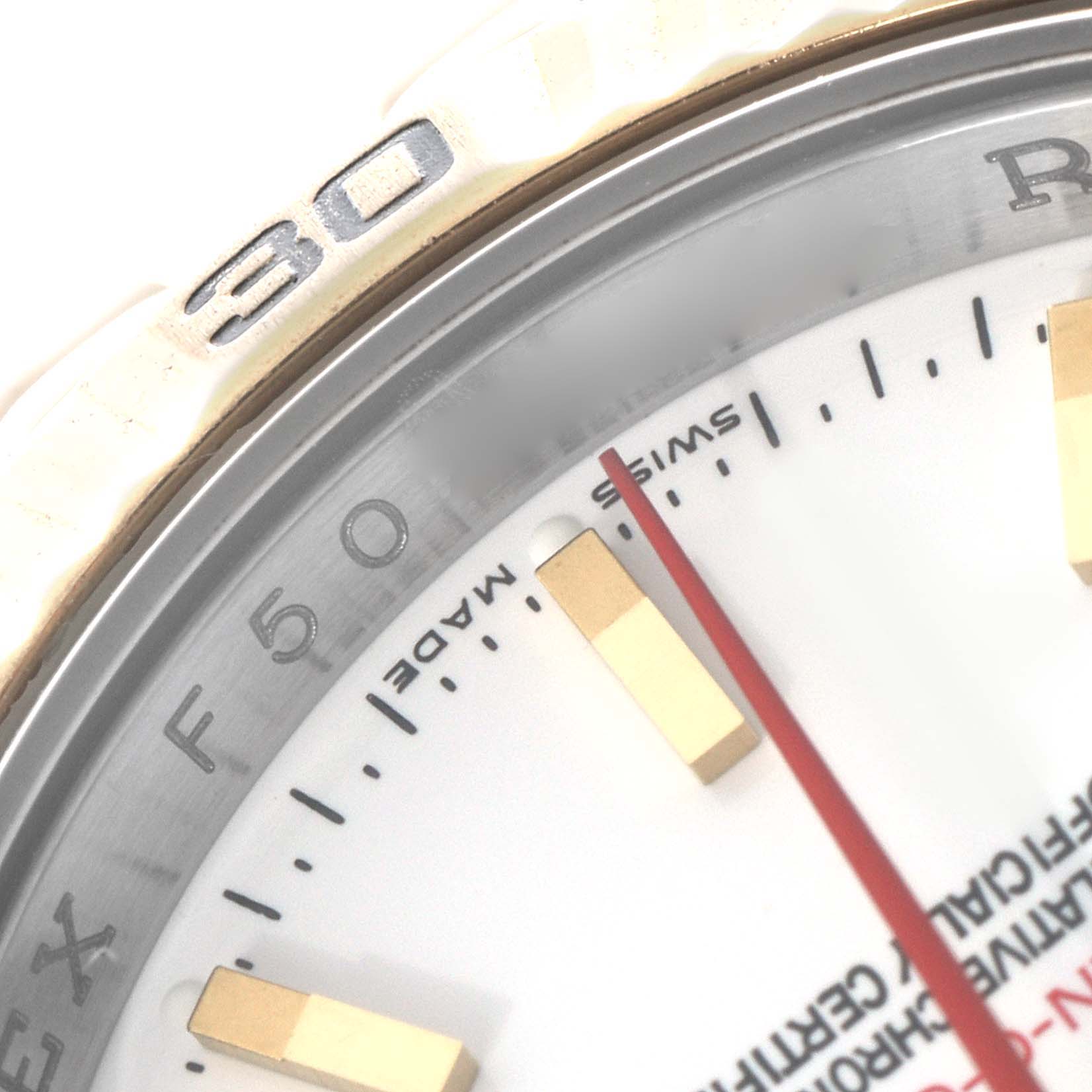 The image shows a close-up of the dial and bezel edge of a Rolex Datejust 116263 Men's Steel and Gold (two tone) White Dial, highlighting the markers and "SWISS MADE" text.