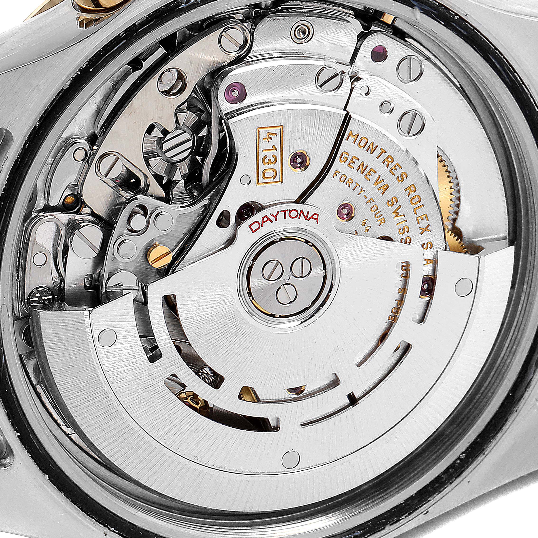 This image shows the intricate movement mechanism of a Rolex Daytona 116523 Men's Steel and Gold (two tone) White Dial 116523 Men's Steel and Gold (two tone) White Dial watch from a close-up angle.