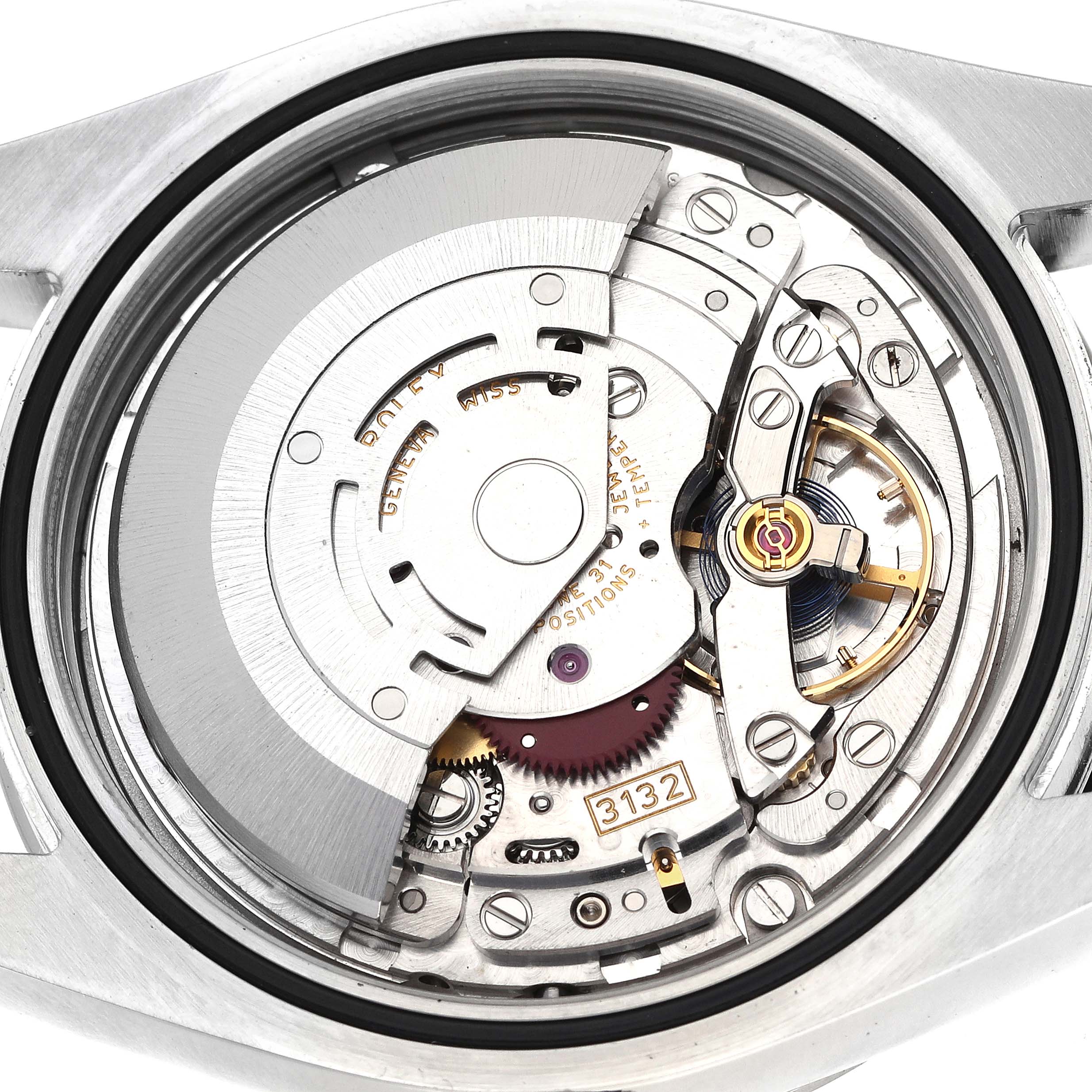 The image shows the movement of a Rolex Explorer 214270 Men's Stainless Steel Black Dial watch from a top-down angle, displaying gears and the rotor.