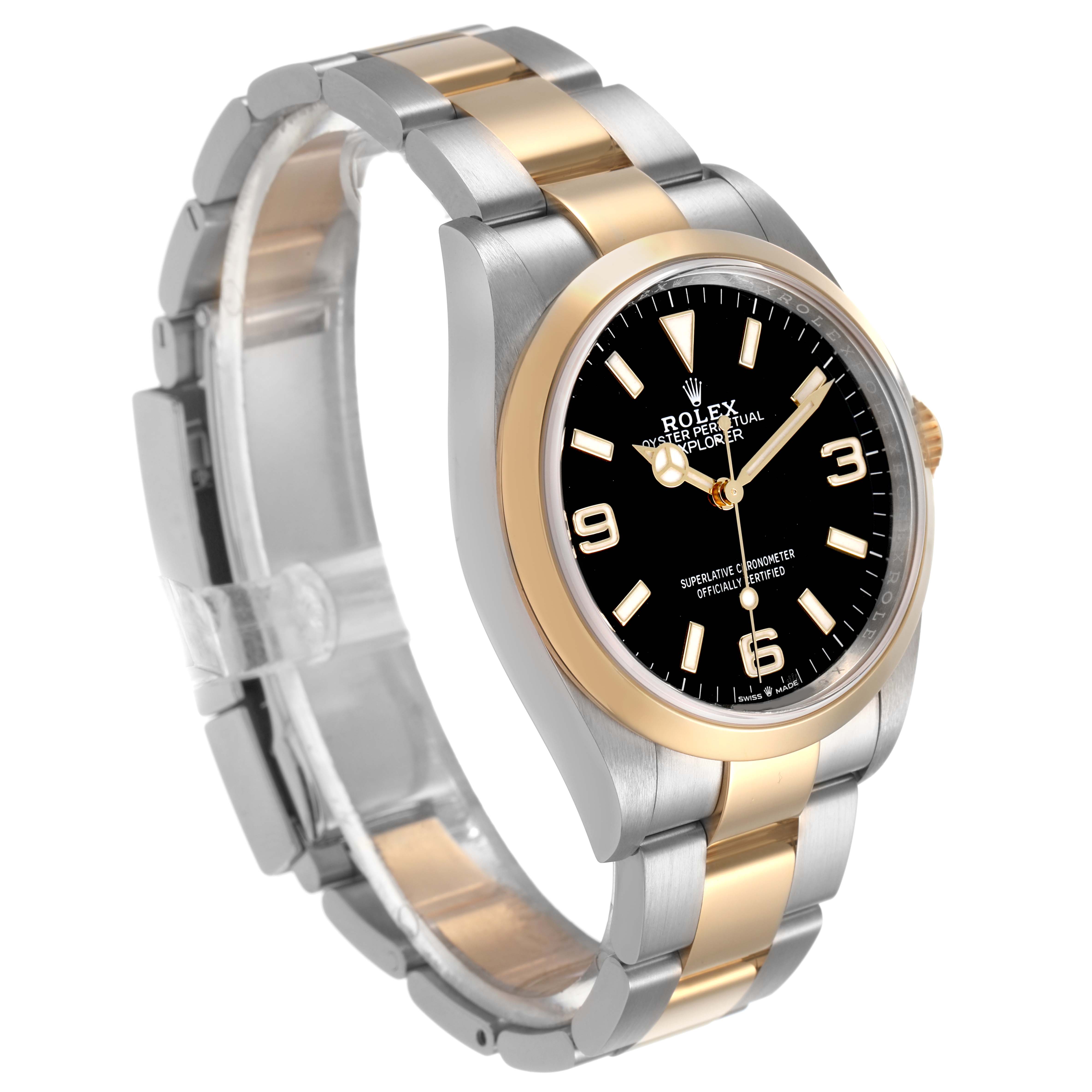 The Rolex Explorer 124273 Men's Steel and Gold (two tone) Black Dial watch is shown at a three-quarter angle, highlighting the bezel, dial, and bracelet.