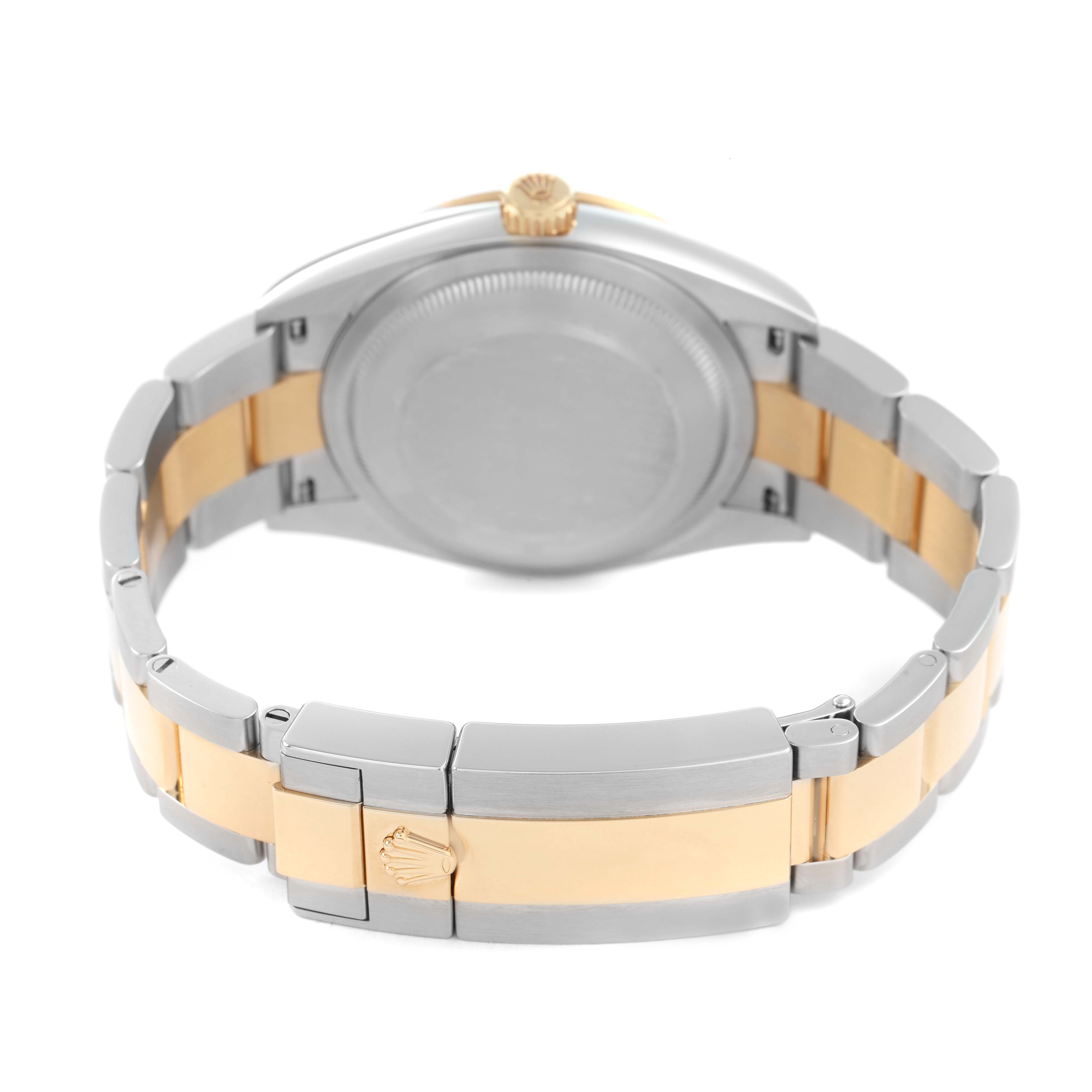 The image shows the back and the bracelet of a Rolex Explorer 124273 Men's Steel and Gold (two tone) Black Dial watch, highlighting its clasp and two-tone metal links.
