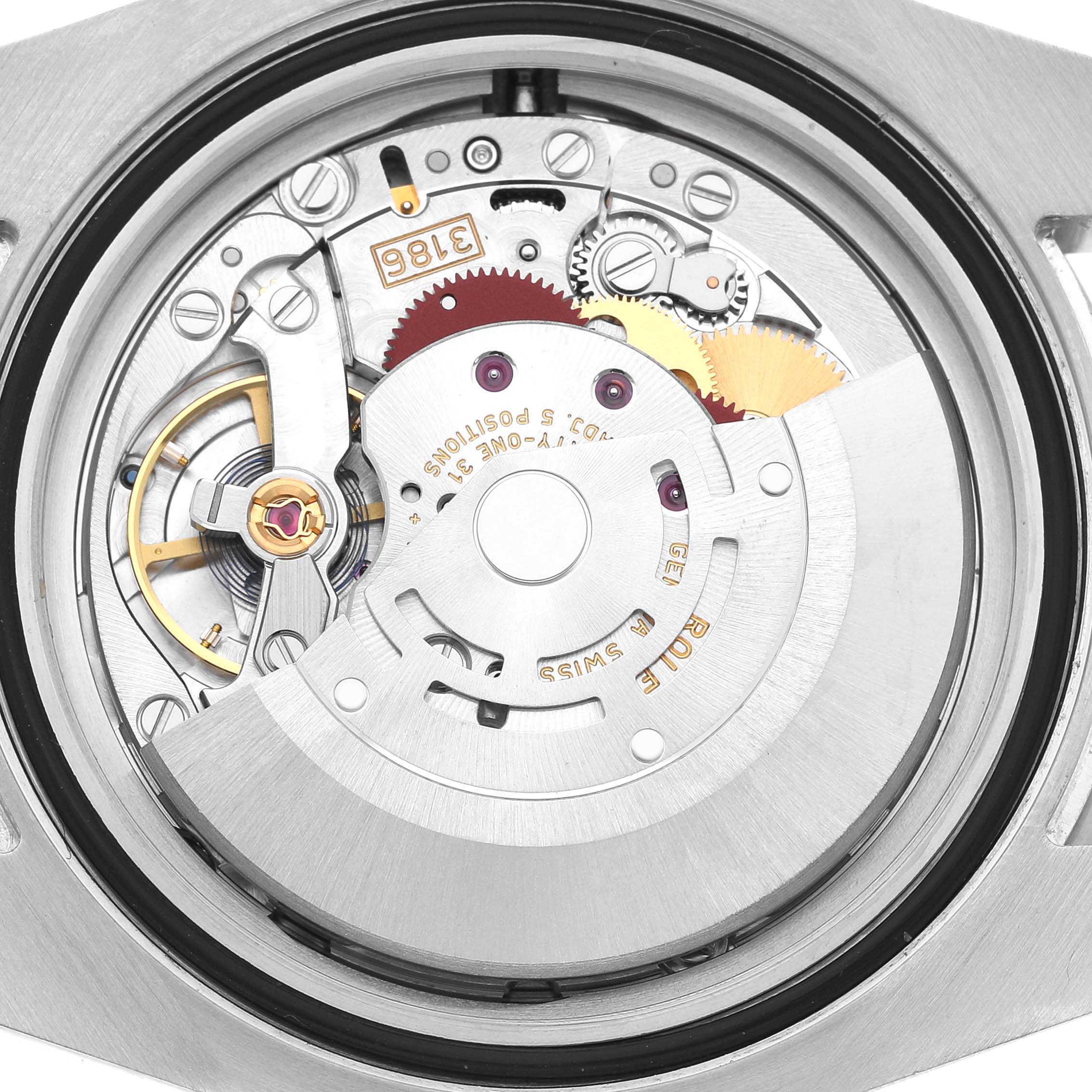 The image shows the movement and internal mechanics of the Rolex GMT-Master 116710BLNR Men's Stainless Steel Black Dial watch from a close-up, top-down angle.