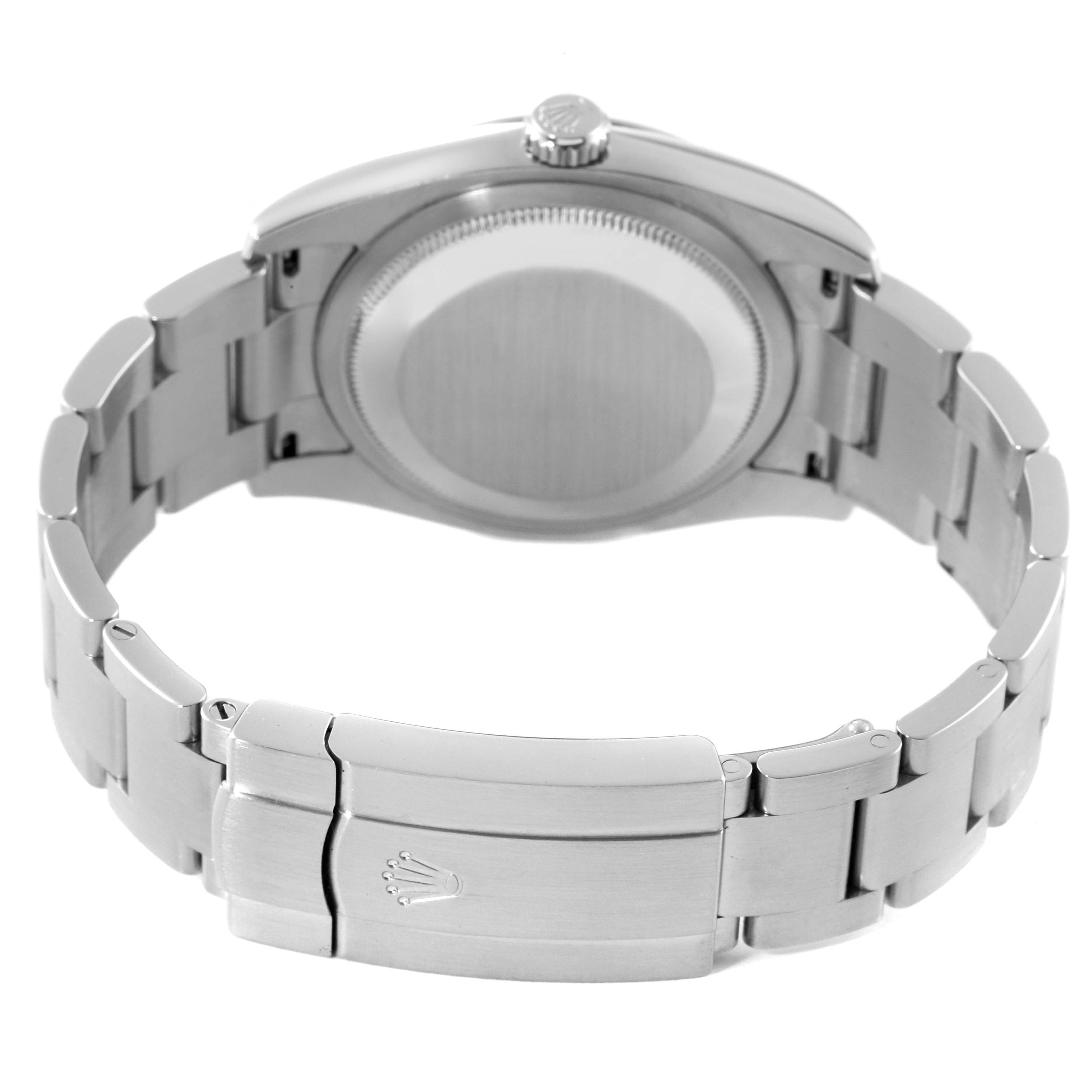 The image shows the back view of a Rolex Oyster Perpetual 116000 Men's Stainless Steel Black Dial 116000 Men's Stainless Steel Black Dial watch, highlighting the case back and metal bracelet with the clasp.