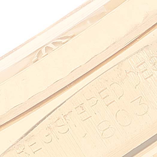 The image shows a close-up view of the inner band of the President model Rolex, featuring engravings.