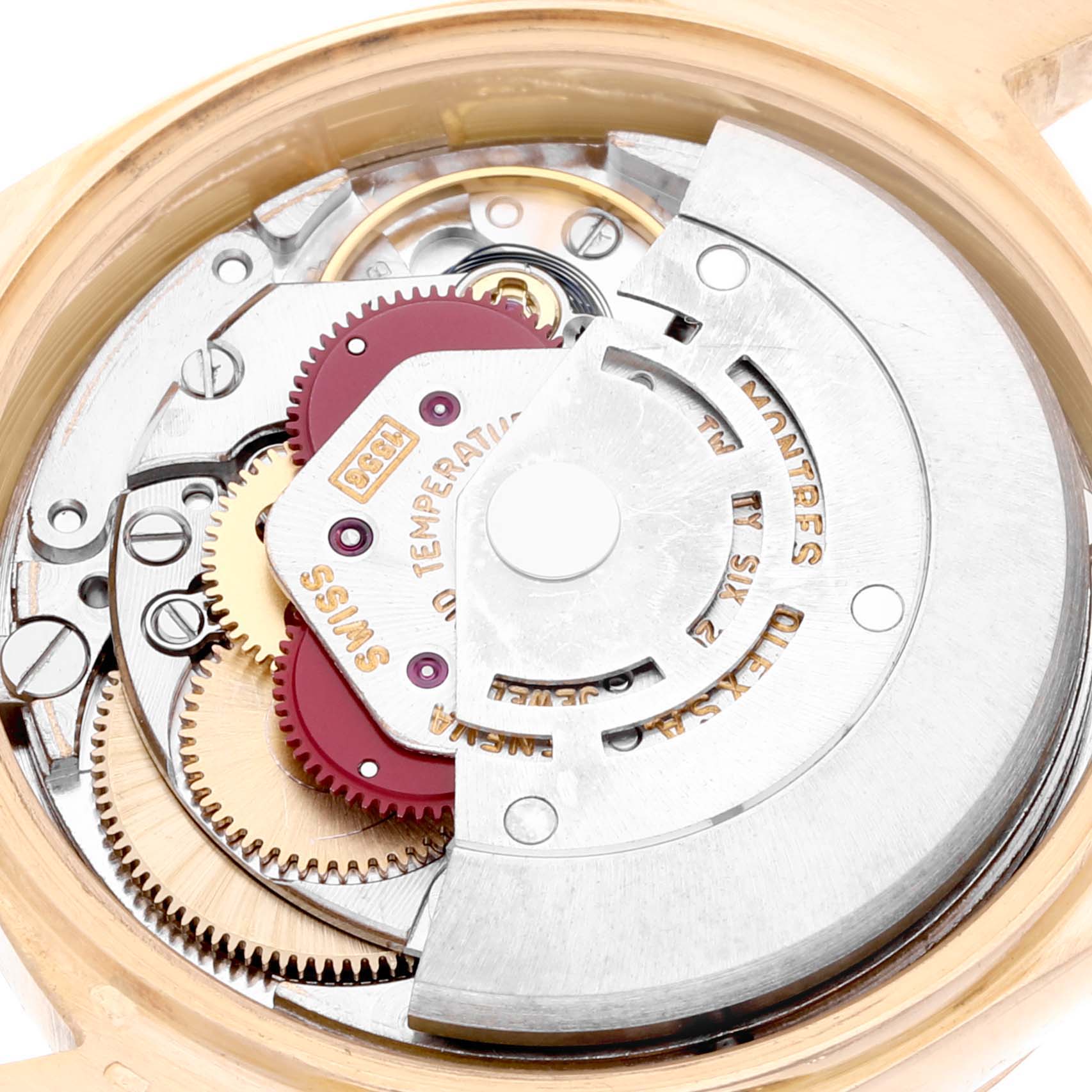 This image shows a close-up view of the internal mechanism and movement parts of a Rolex President 1803 Men's Yellow Gold Champagne Dial 1803 Men's Yellow Gold Champagne Dial model watch.
