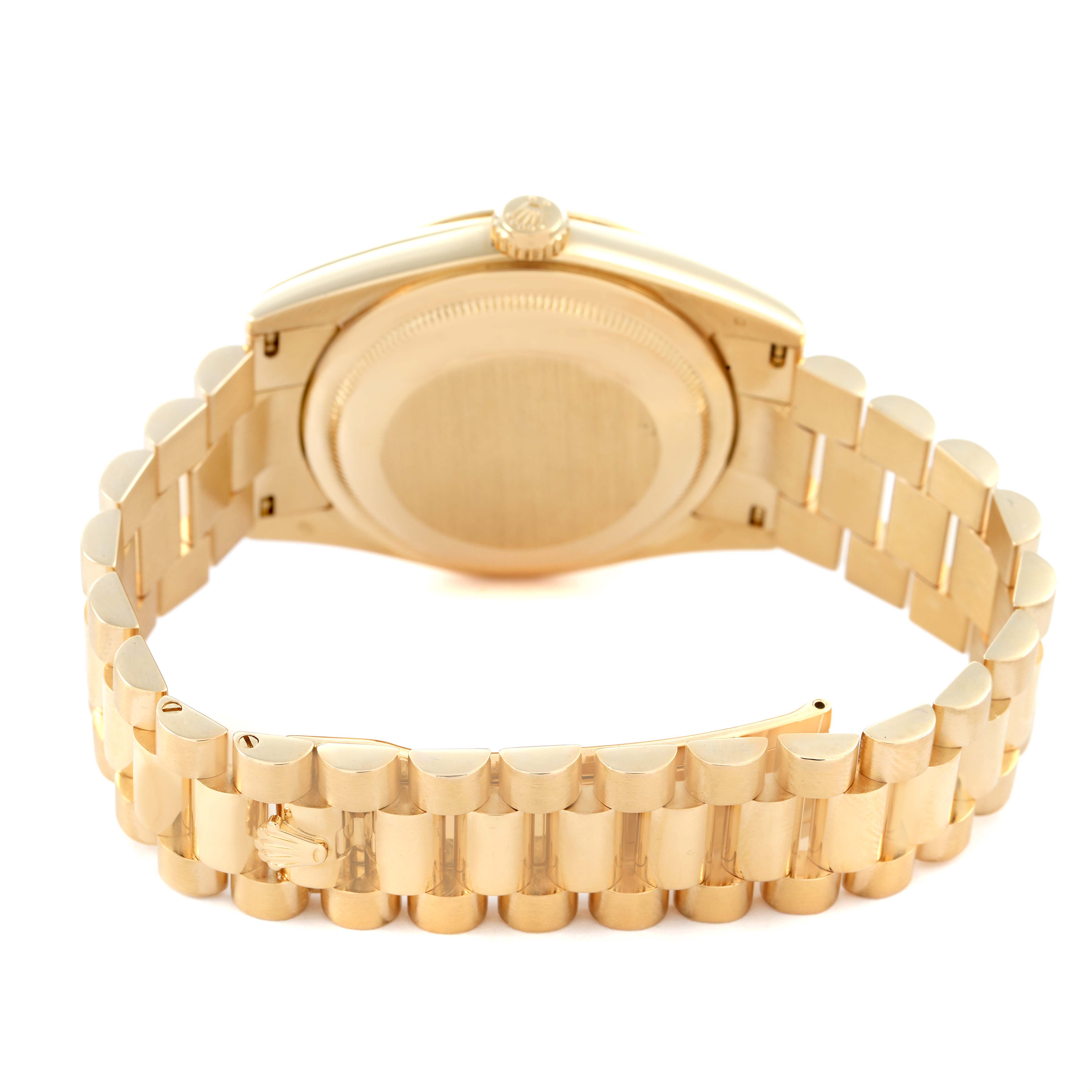 The image shows the case back and bracelet of the Rolex President 118238 Men's Yellow Gold Champagne Dial model at a rear angle.