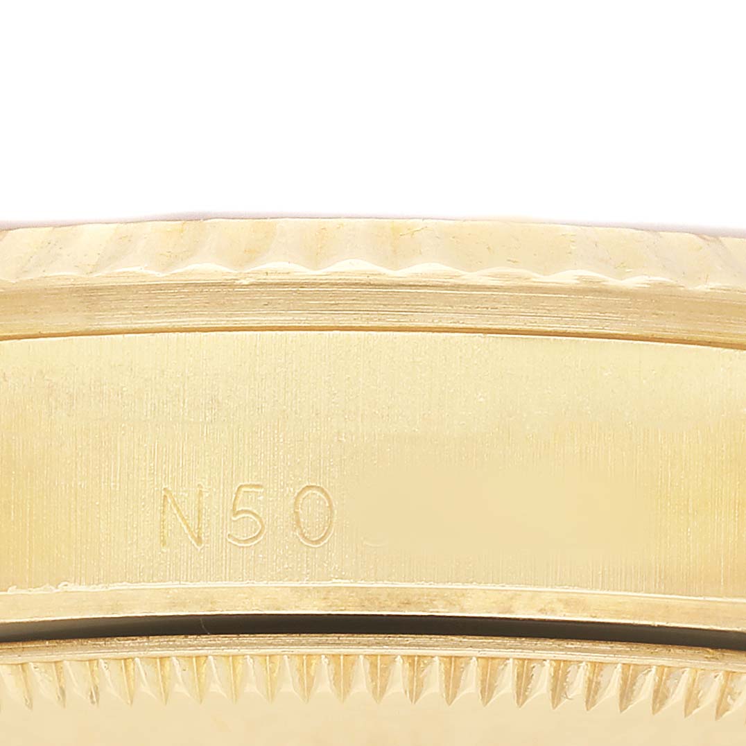 The image shows a close-up side view of the gold bezel and edge details of a Rolex President 68278 Women's Yellow Gold Champagne Dial watch.
