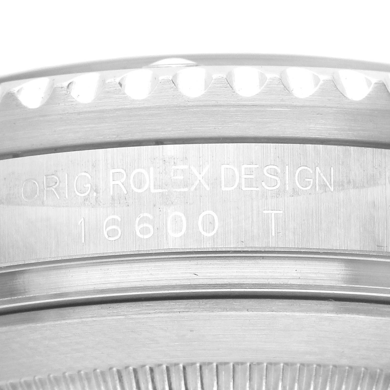 The image shows the side view of a Rolex Sea-Dweller 16600 Men's Stainless Steel Black Dial, focusing on the engraved bezel and case with model information.