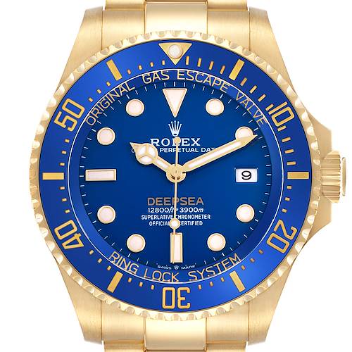The image shows a front view of the Rolex Sea-Dweller 136668 Men's Yellow Gold Blue Dial watch, highlighting the blue dial, gold bezel, and crown.