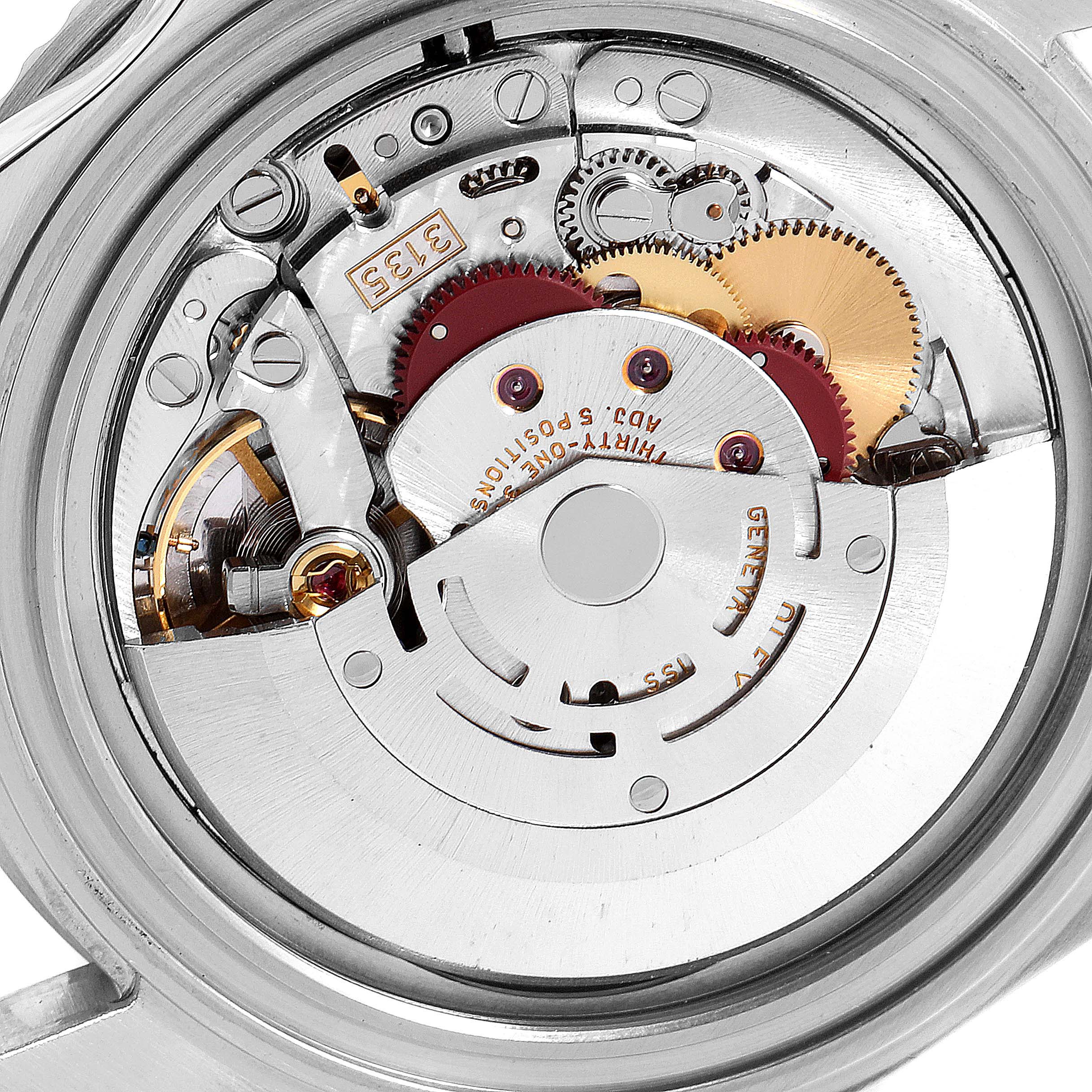The image shows a close-up view of the movement inside a Rolex Submariner 16610LV Men
s Stainless Steel Black Dial 16610LV Men
s Stainless Steel Black Dial watch, highlighting the gears and mechanical parts.