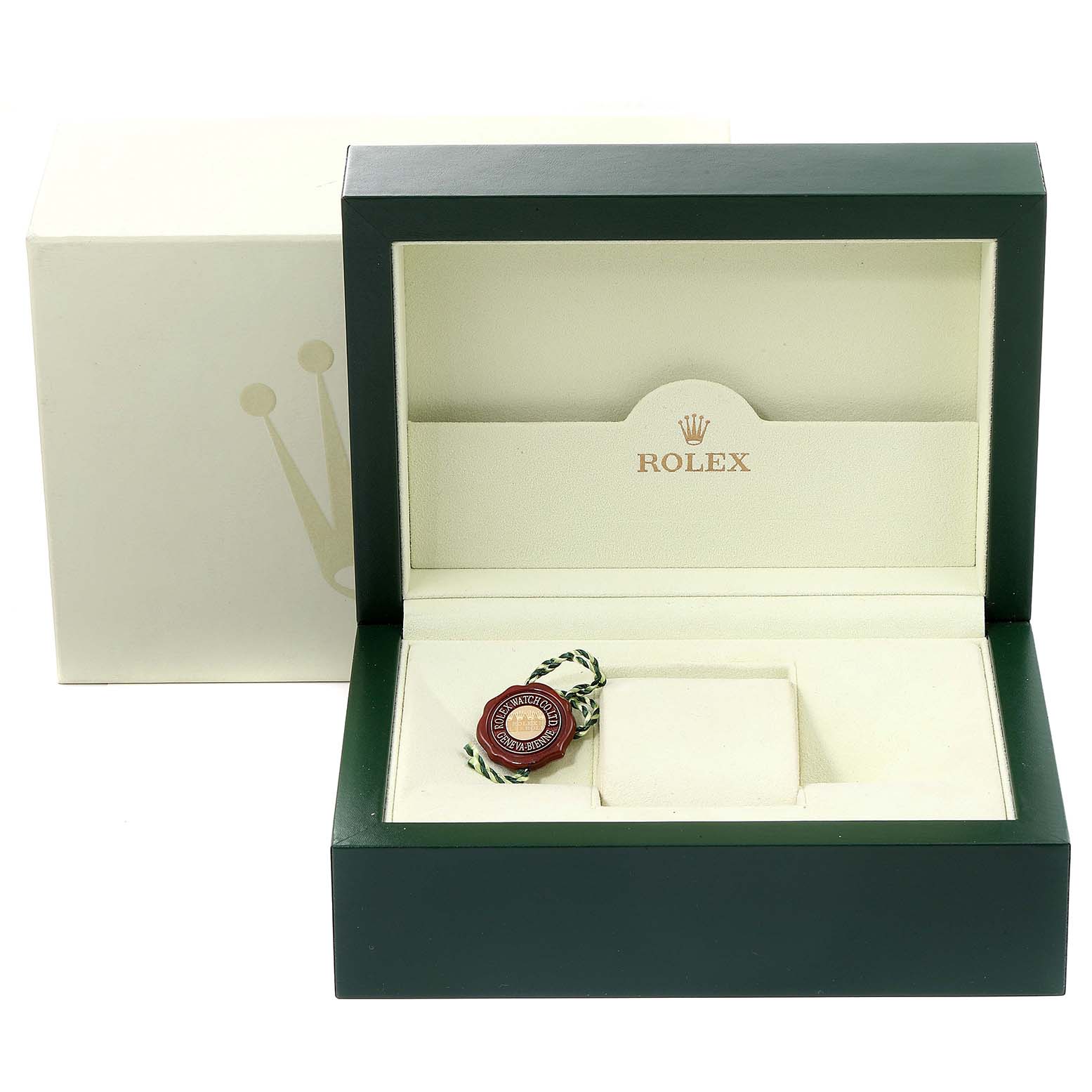 The image shows an open green Rolex box for a Submariner model, including an authenticity tag, photographed from the front.