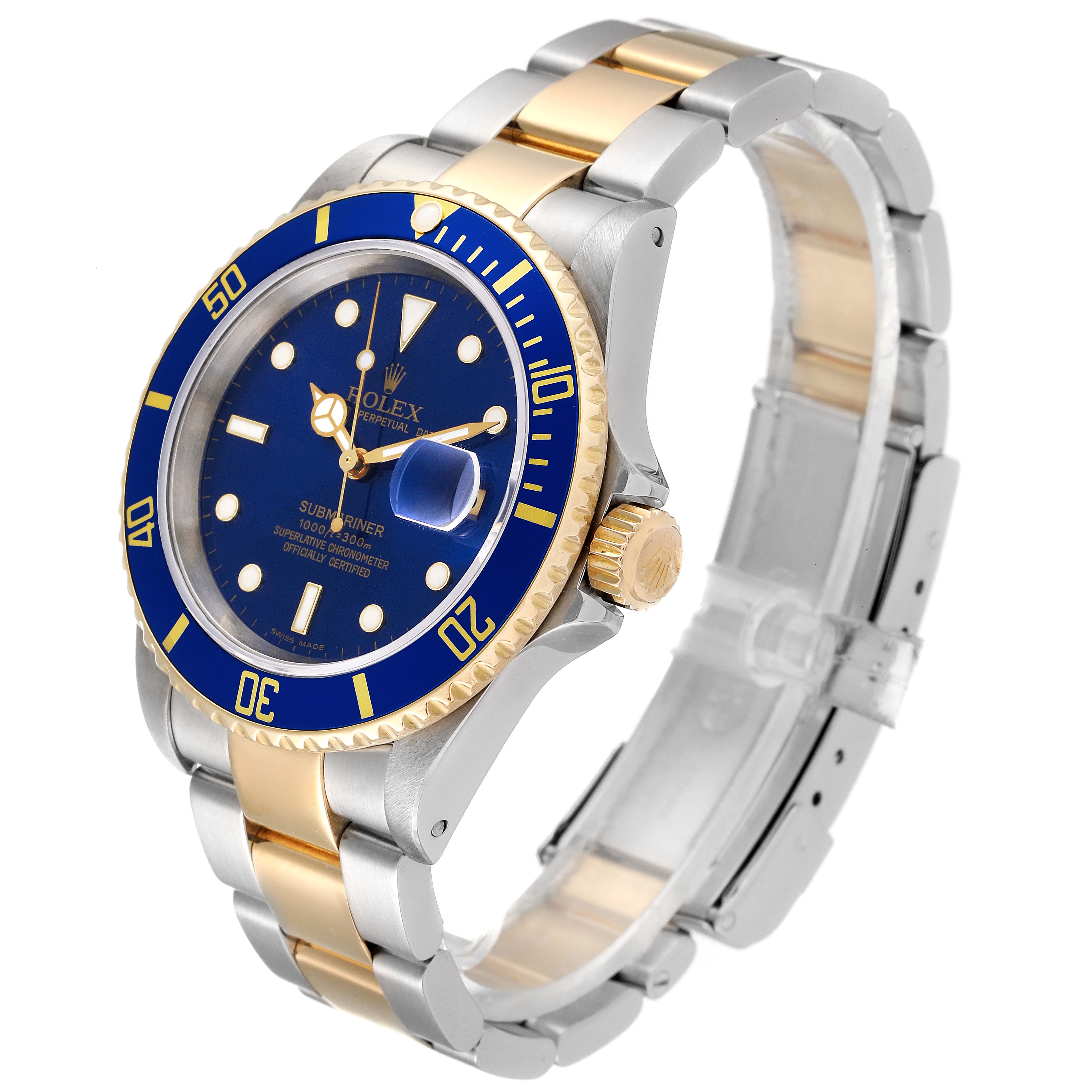 The Rolex Submariner 16613 Men's Steel and Gold (two tone) Blue Dial 16613 Men's Steel and Gold (two tone) Blue Dial watch is shown at a slight side angle, displaying its blue dial, gold bezel, and two-tone metal bracelet.