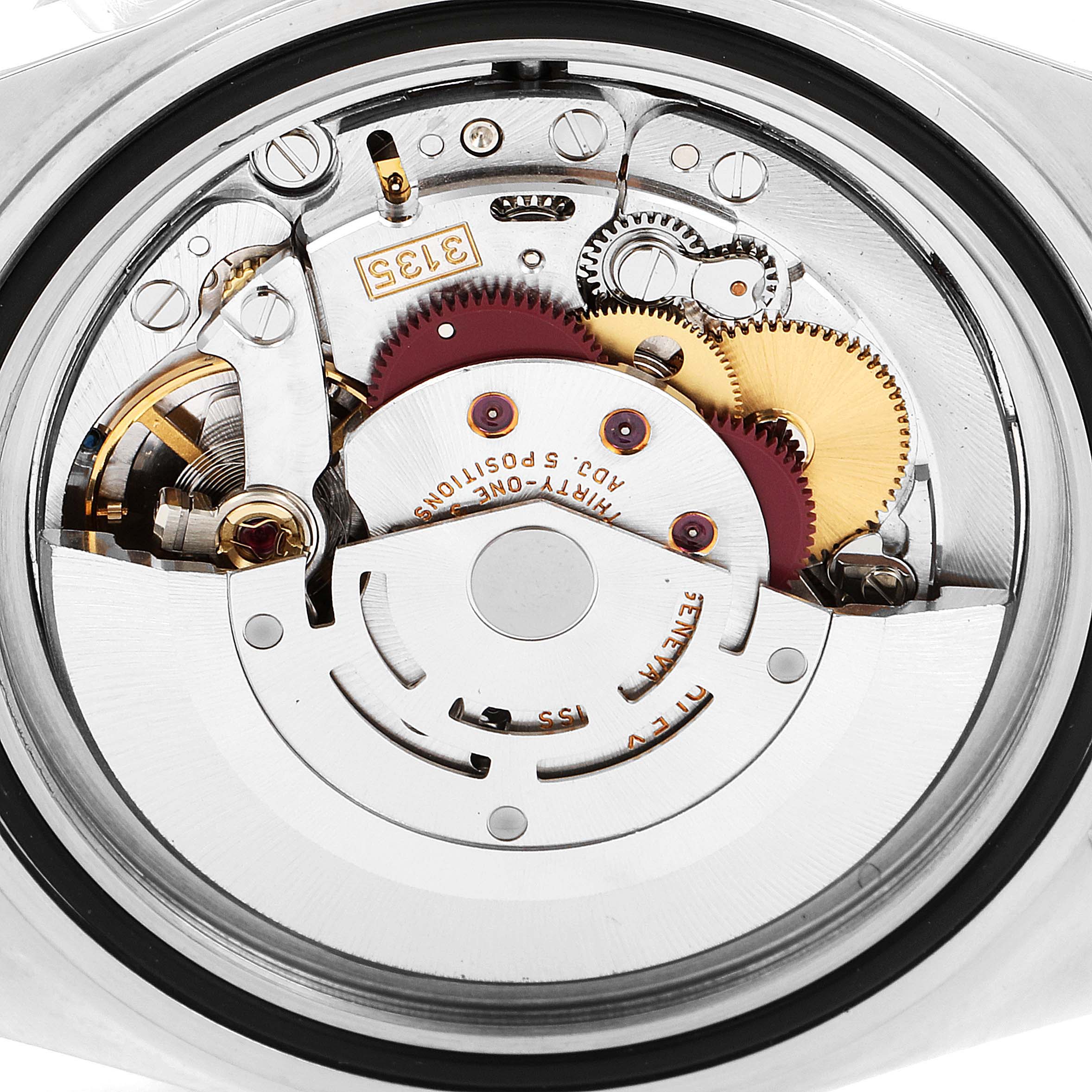 This image shows a close-up view of the internal mechanical movement of a Rolex Submariner 16613 Men
s Steel and Gold (two tone) Blue Dial 16613 Men
s Steel and Gold (two tone) Blue Dial watch.