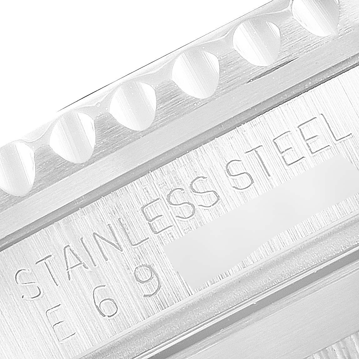 This image shows a close-up of the side engraving of a stainless steel Rolex Submariner 16610 Men
s Stainless Steel Black Dial 16610 Men
s Stainless Steel Black Dial watch.