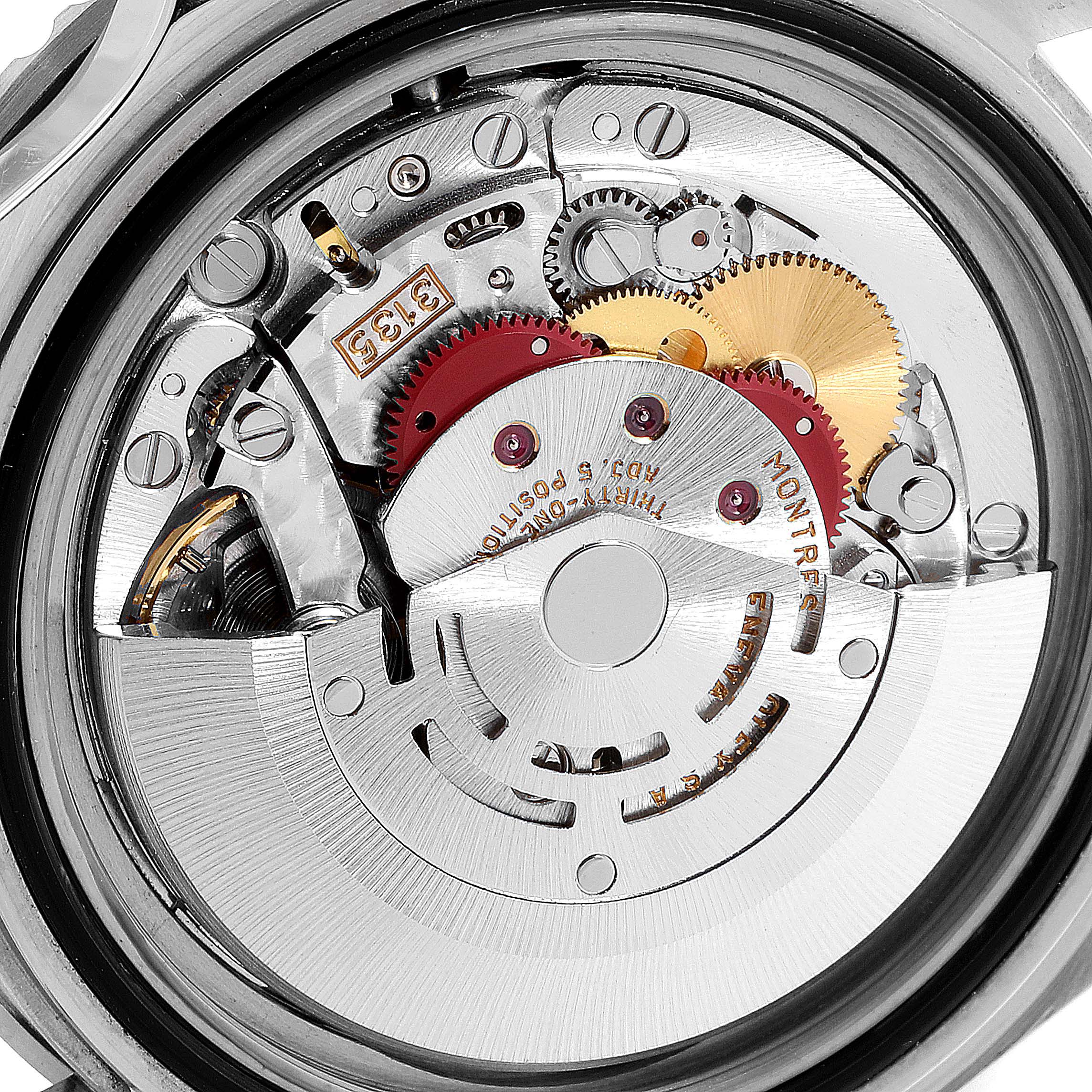 This image shows a close-up view of the intricate inner mechanical movement of a Rolex Submariner 16610 Men
s Stainless Steel Black Dial 16610 Men
s Stainless Steel Black Dial watch.