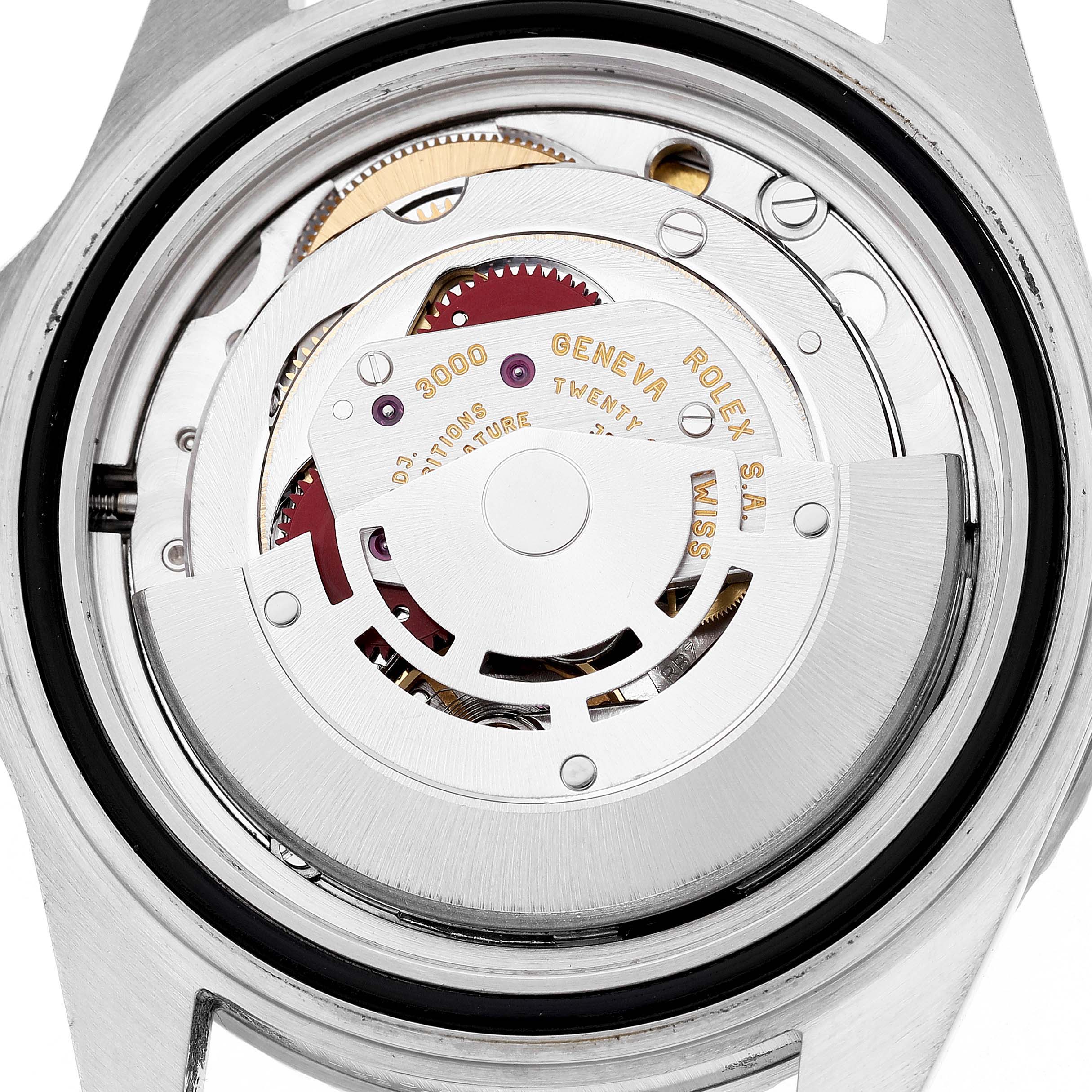 The image shows the case back of a Rolex Submariner 14060 Men's Stainless Steel Black Dial watch, highlighting its intricate mechanical movement.
