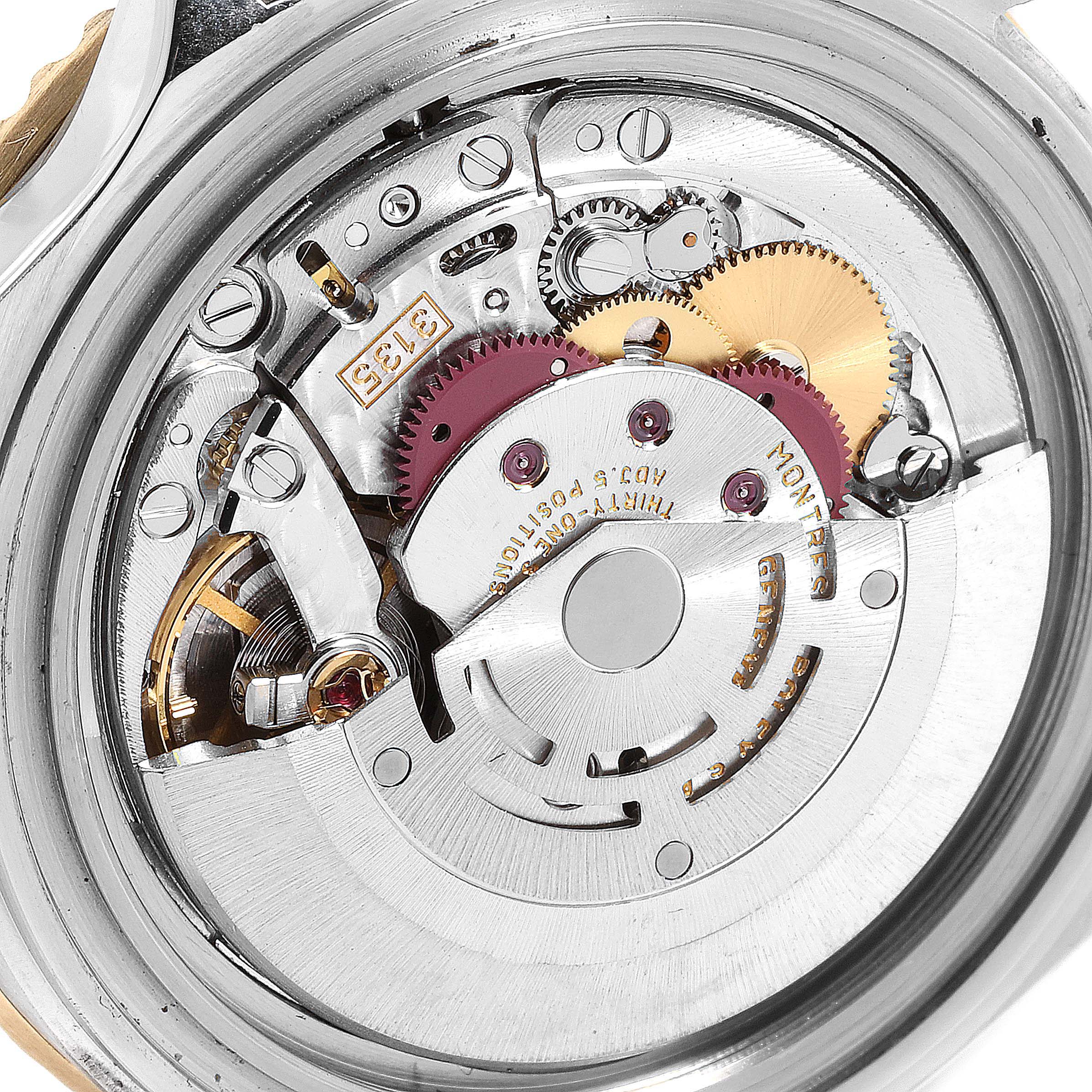 This image shows the internal movement mechanism of the Rolex Submariner 16613 Men's Steel and Gold (two tone) Grey Dial 16613 Men's Steel and Gold (two tone) Grey Dial watch from a close-up, back angle view.