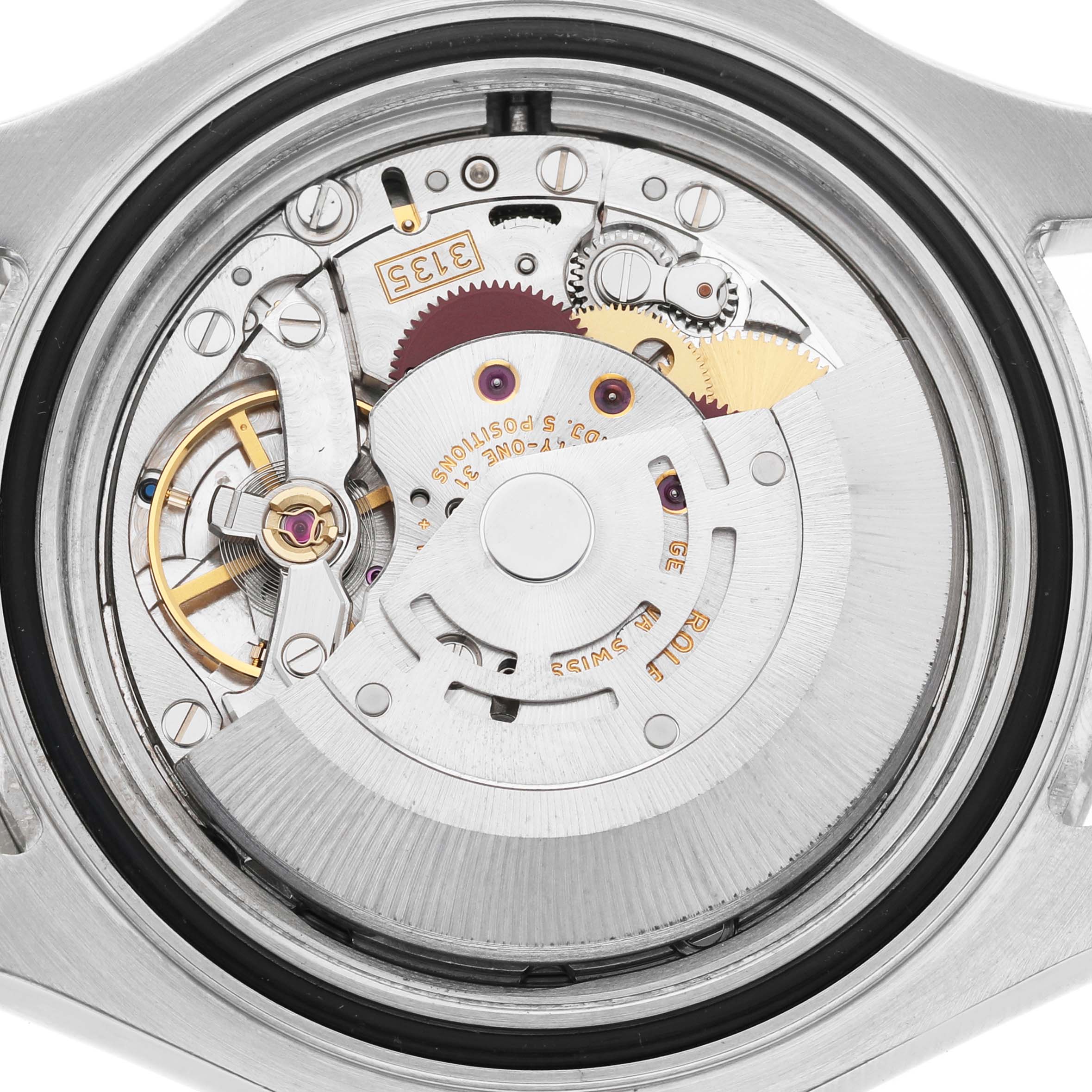 The image shows the internal movement of a Rolex Yacht-Master 16622 Men's Stainless Steel Silver Dial watch from a top-down angle, revealing its intricate gears and components.