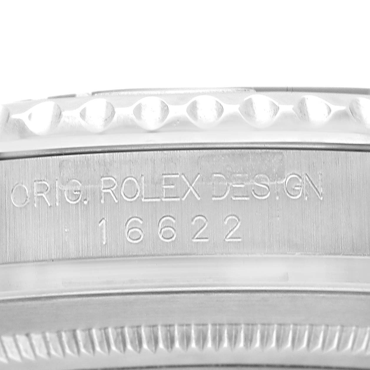 The image shows a close-up of the Rolex Yacht-Master 16622 Men's Stainless Steel Silver Dial's side, highlighting the engraved model number and design details.