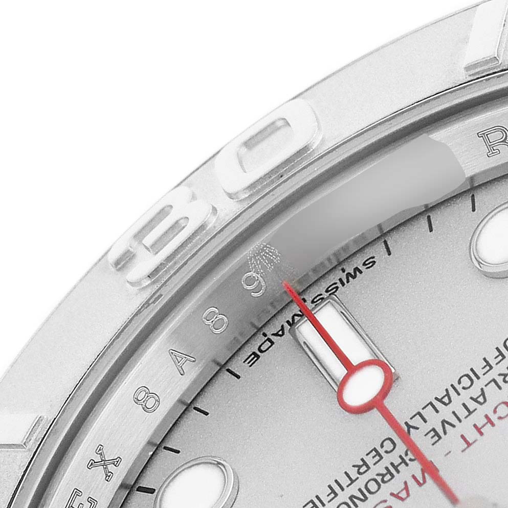 The image shows a close-up of the Rolex Yacht-Master 116622 Men's Stainless Steel Silver Dial watch's bezel, dial, and part of the minute hand.