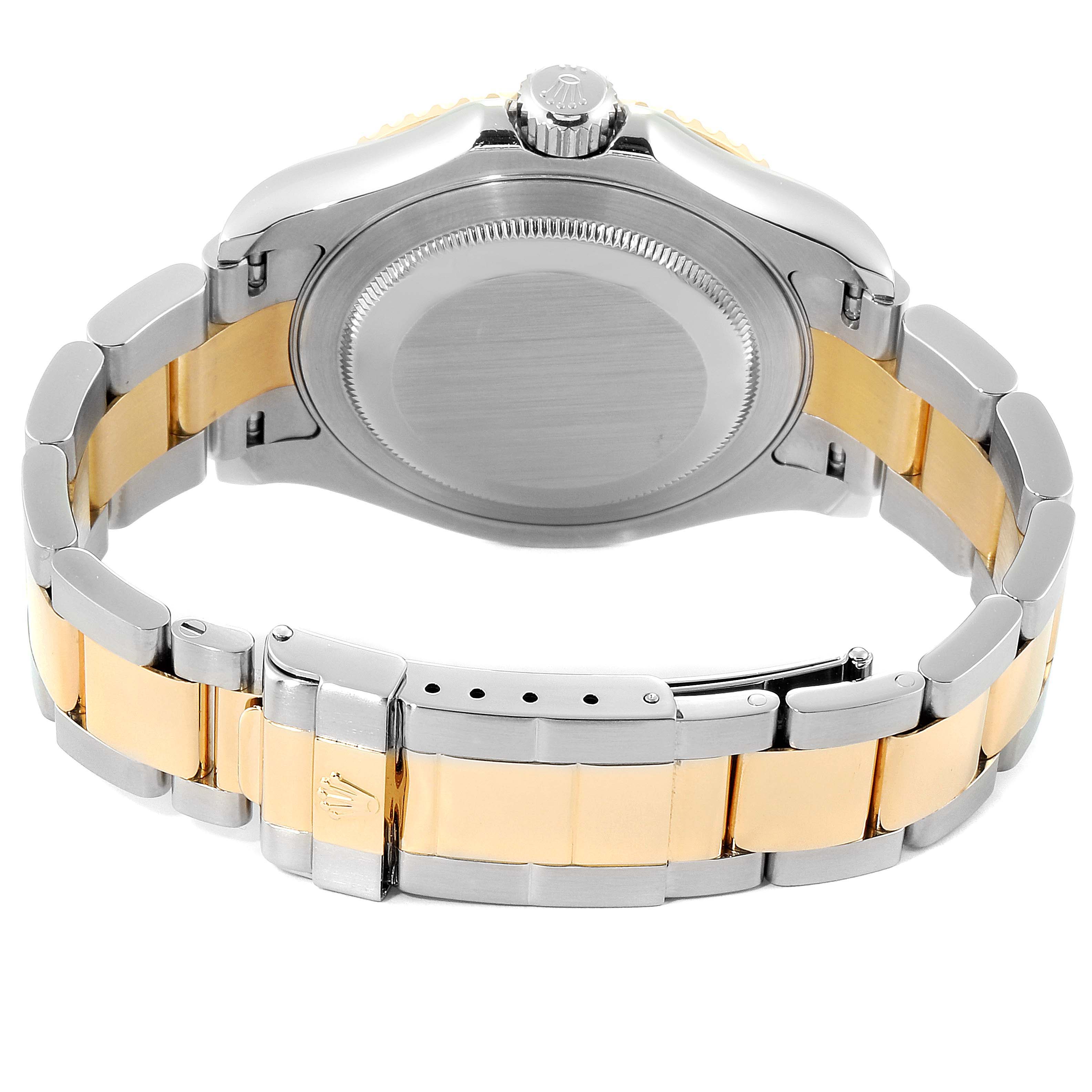 The image shows the back view of a Rolex Yacht-Master 16623 Men's Steel and Gold (two tone) White Dial 16623 Men's Steel and Gold (two tone) White Dial watch, highlighting its clasp, bracelet, and casing.