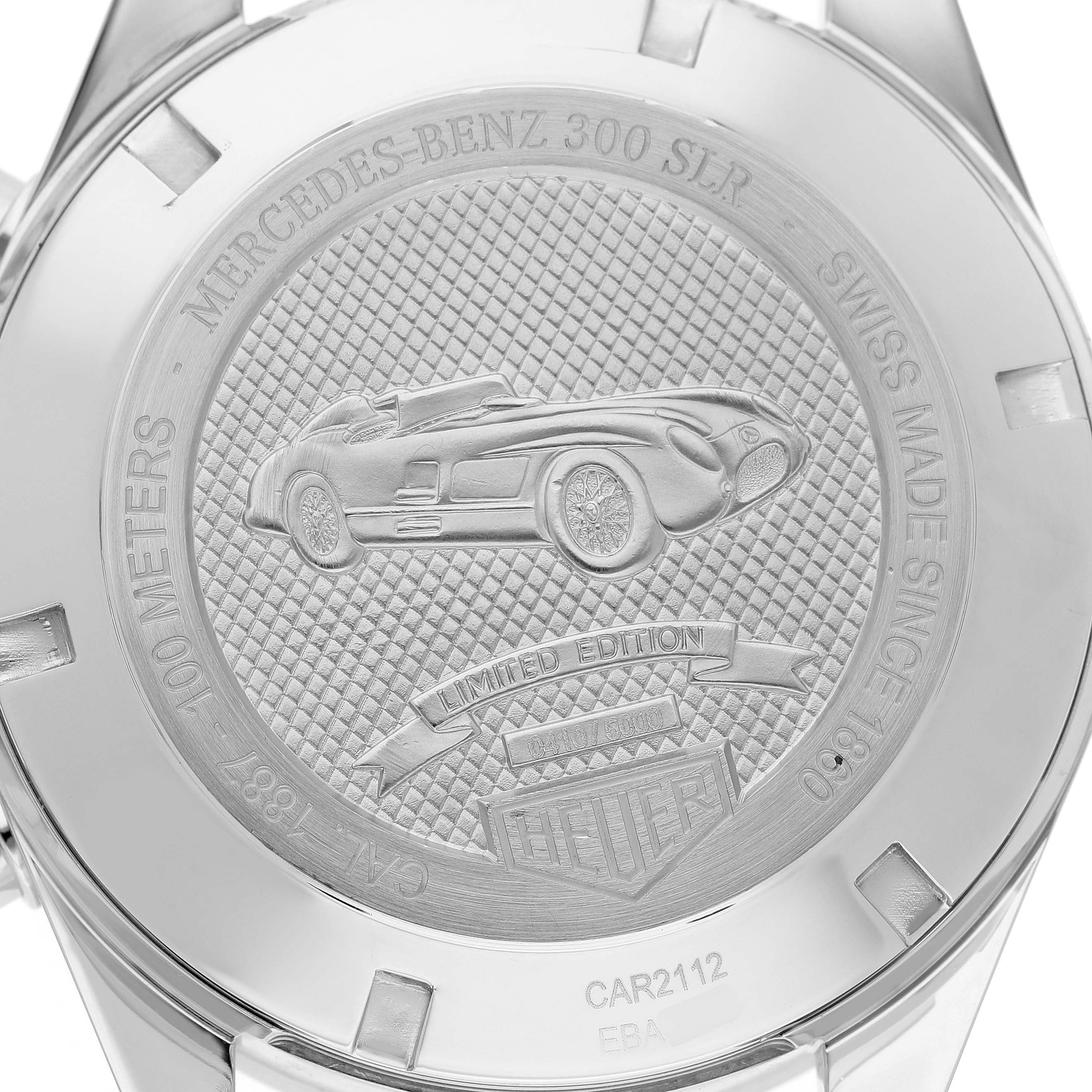 The image shows the engraved case back of a Tag Heuer Carrera CAR2112.FC6267 Men's Stainless Steel Brown Dial watch, featuring a limited edition design.