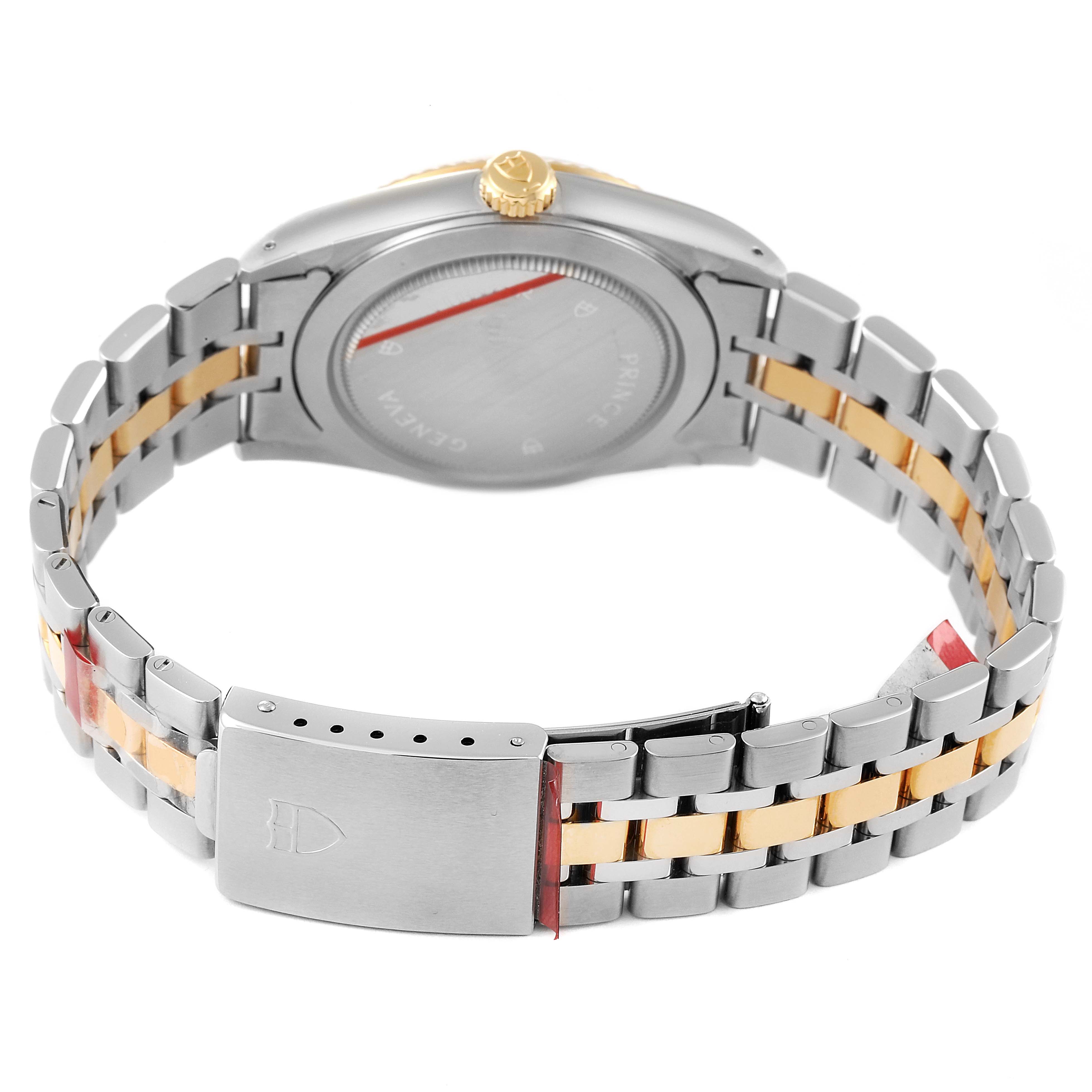 This image shows the Prince model by Tudor from the rear, highlighting the back case, crown, and two-tone bracelet.