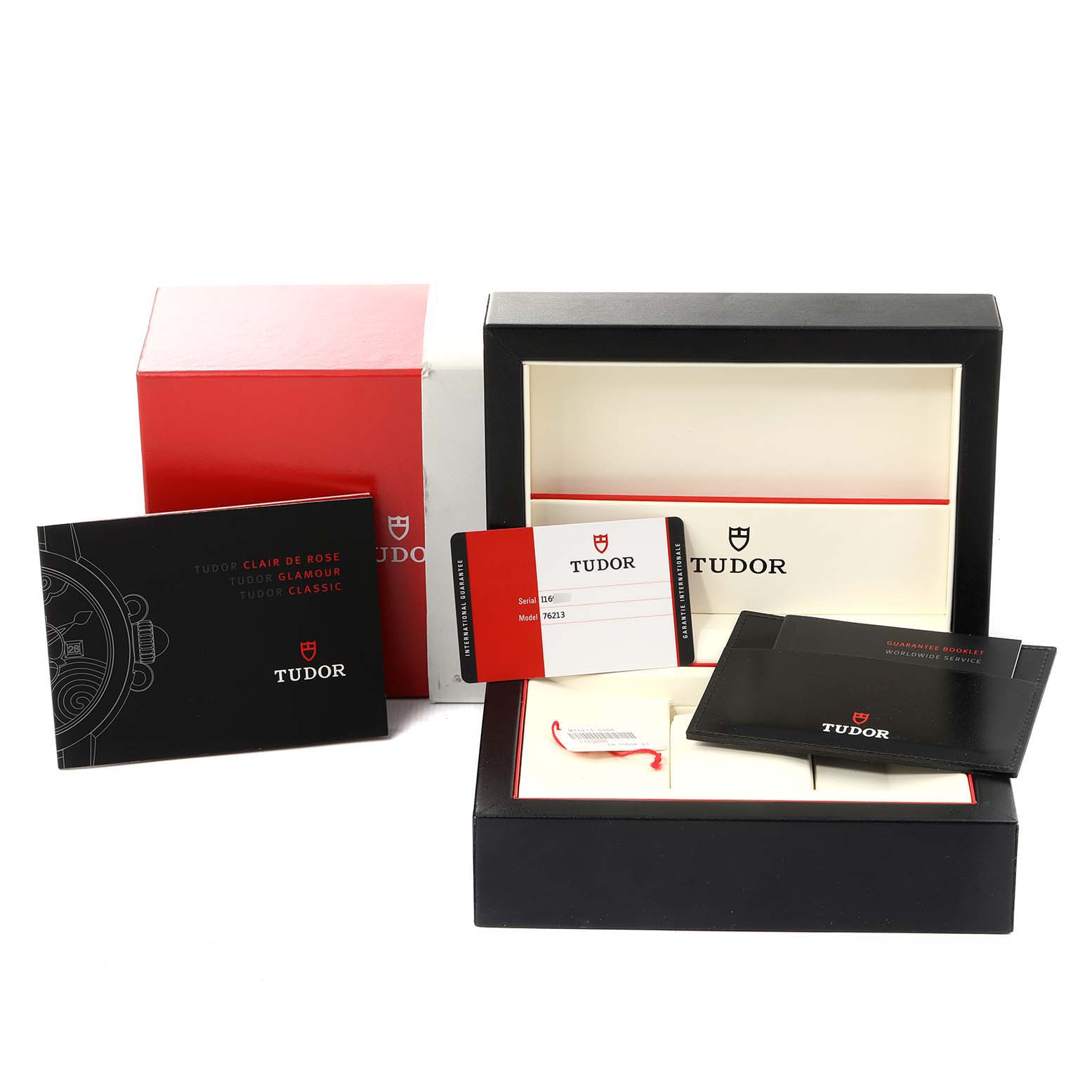 The image shows the packaging and documentation for a Tudor Prince 76213 Men
s Steel and Gold (two tone) Silver Dial 76213 Men
s Steel and Gold (two tone) Silver Dial model watch, including the box, warranty card, and manuals.