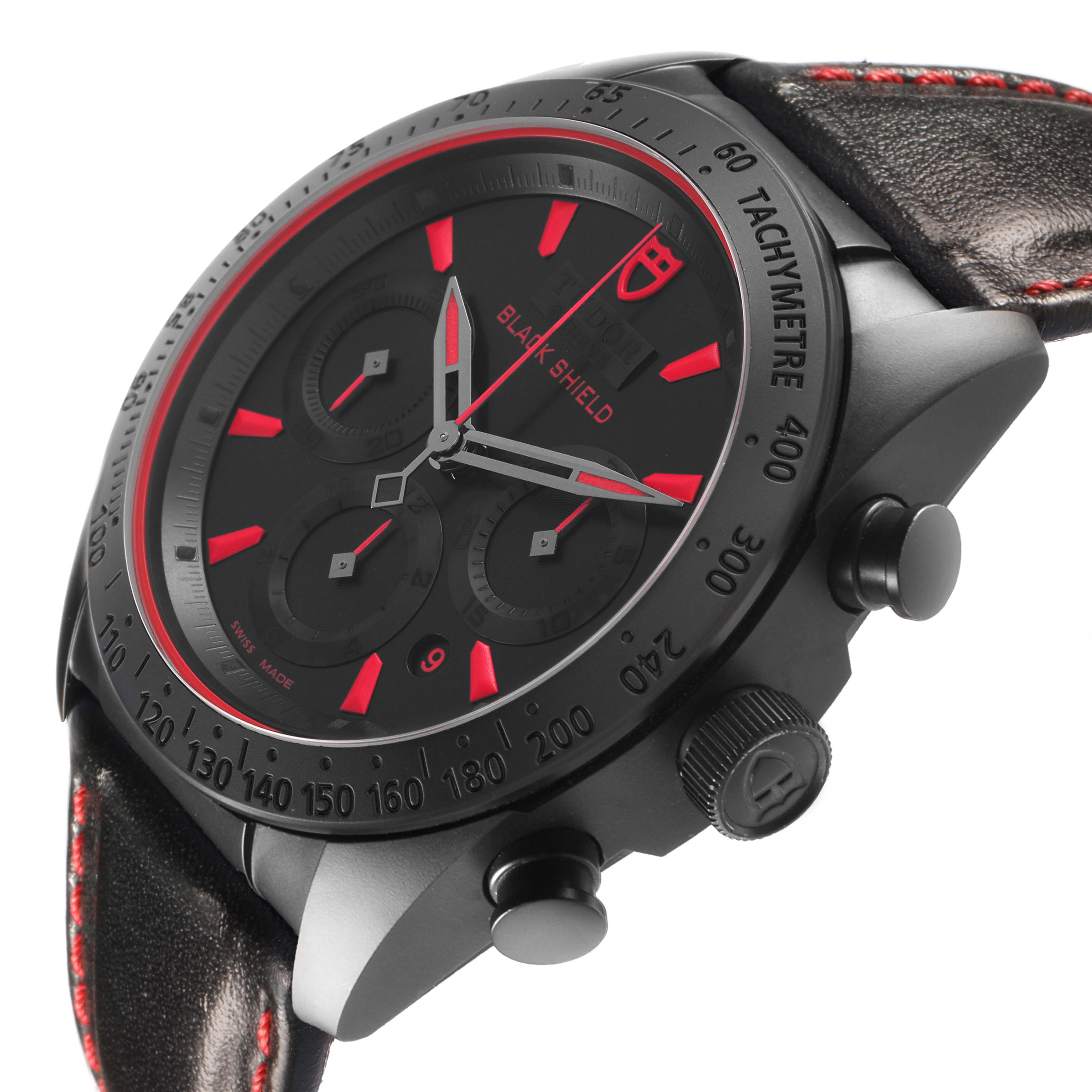 The Tudor Fastrider 42000CR Men's Ceramic Black Dial is shown at an angled view, highlighting the bezel, dial, and leather strap with red accents.
