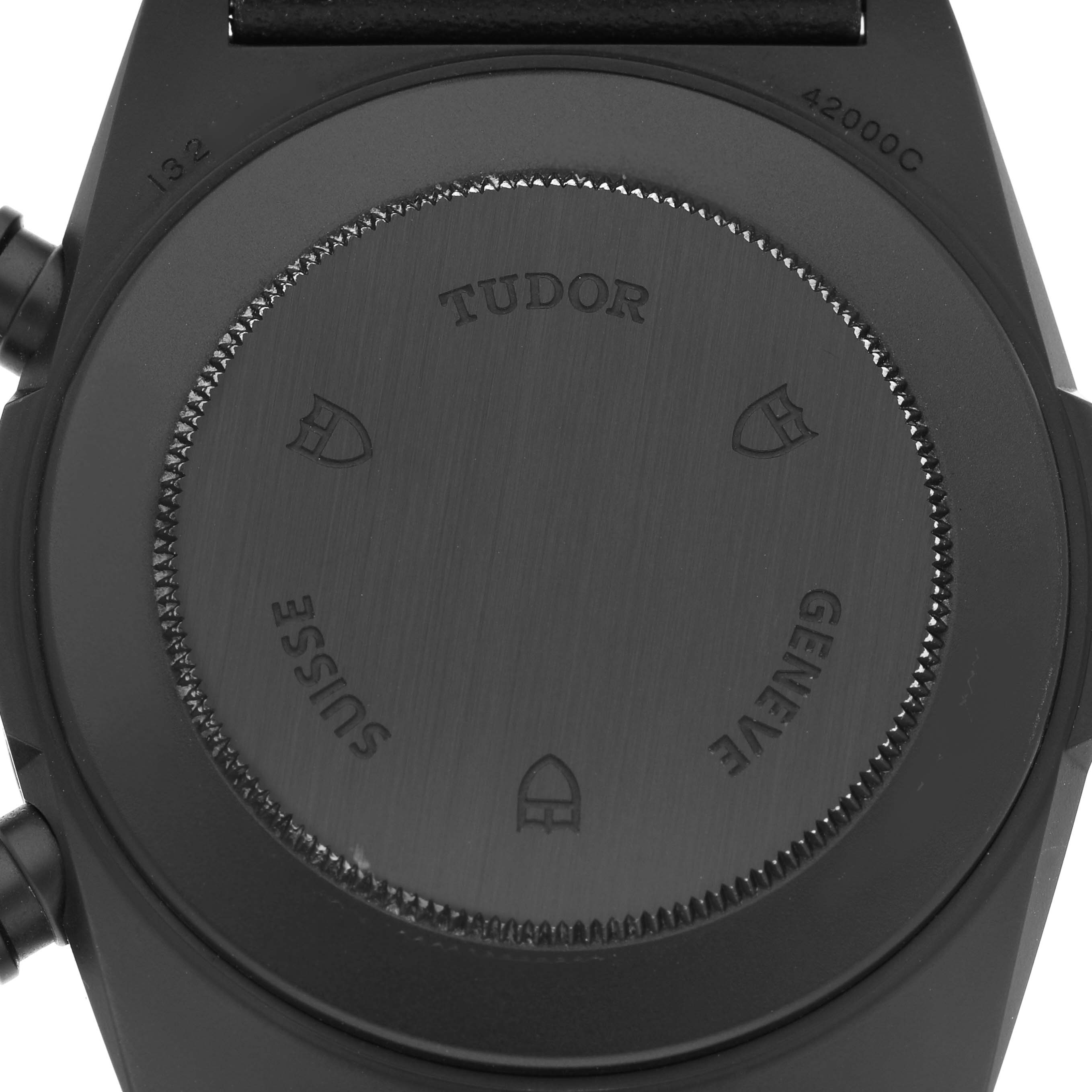 The image shows the back case of a Tudor Fastrider 42000CR Men's Ceramic Black Dial watch, displaying branding and model details.