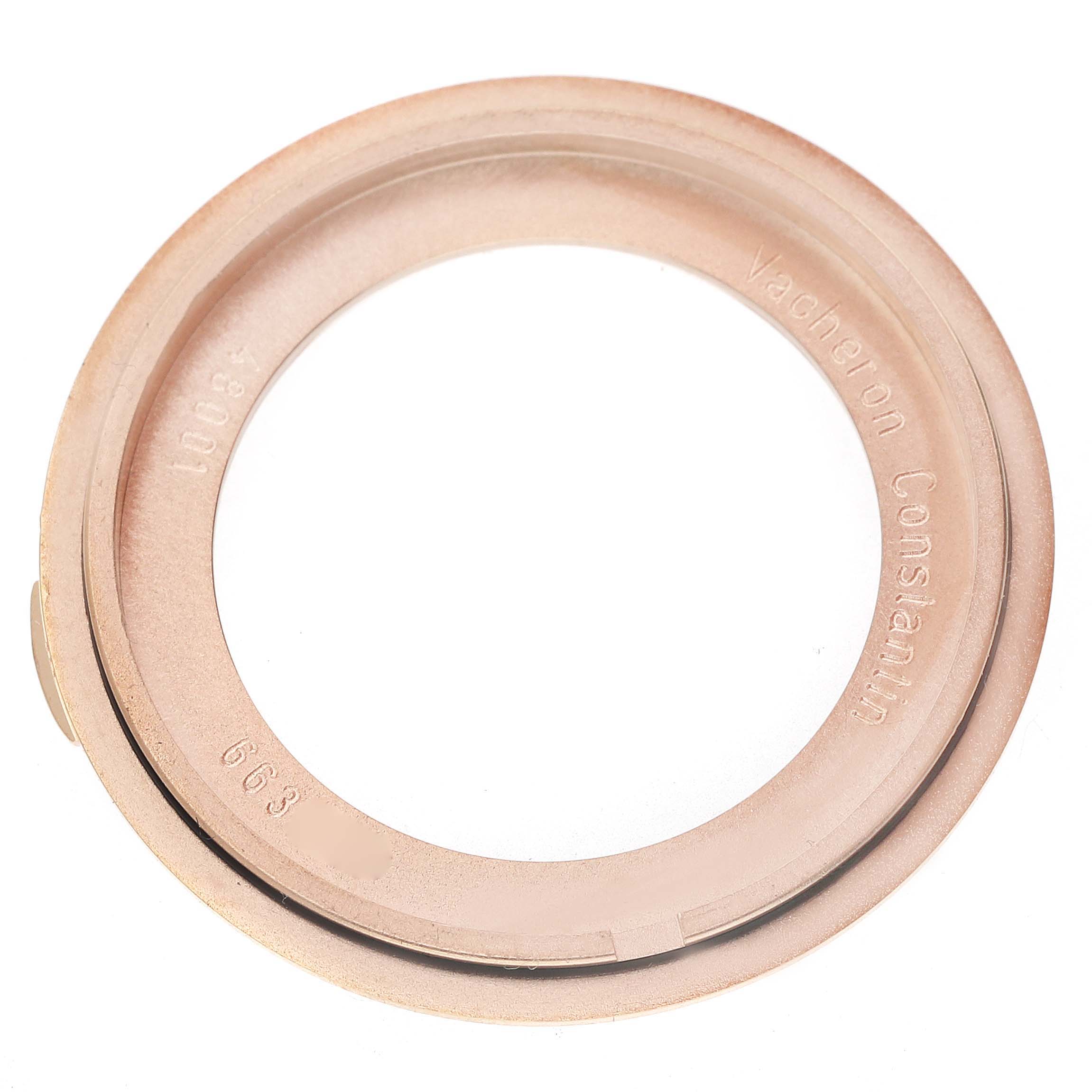 The image shows a top view of the Vacheron Constantin Historiques 48001R Men's Rose Gold White Dial model watch bezel in rose gold.