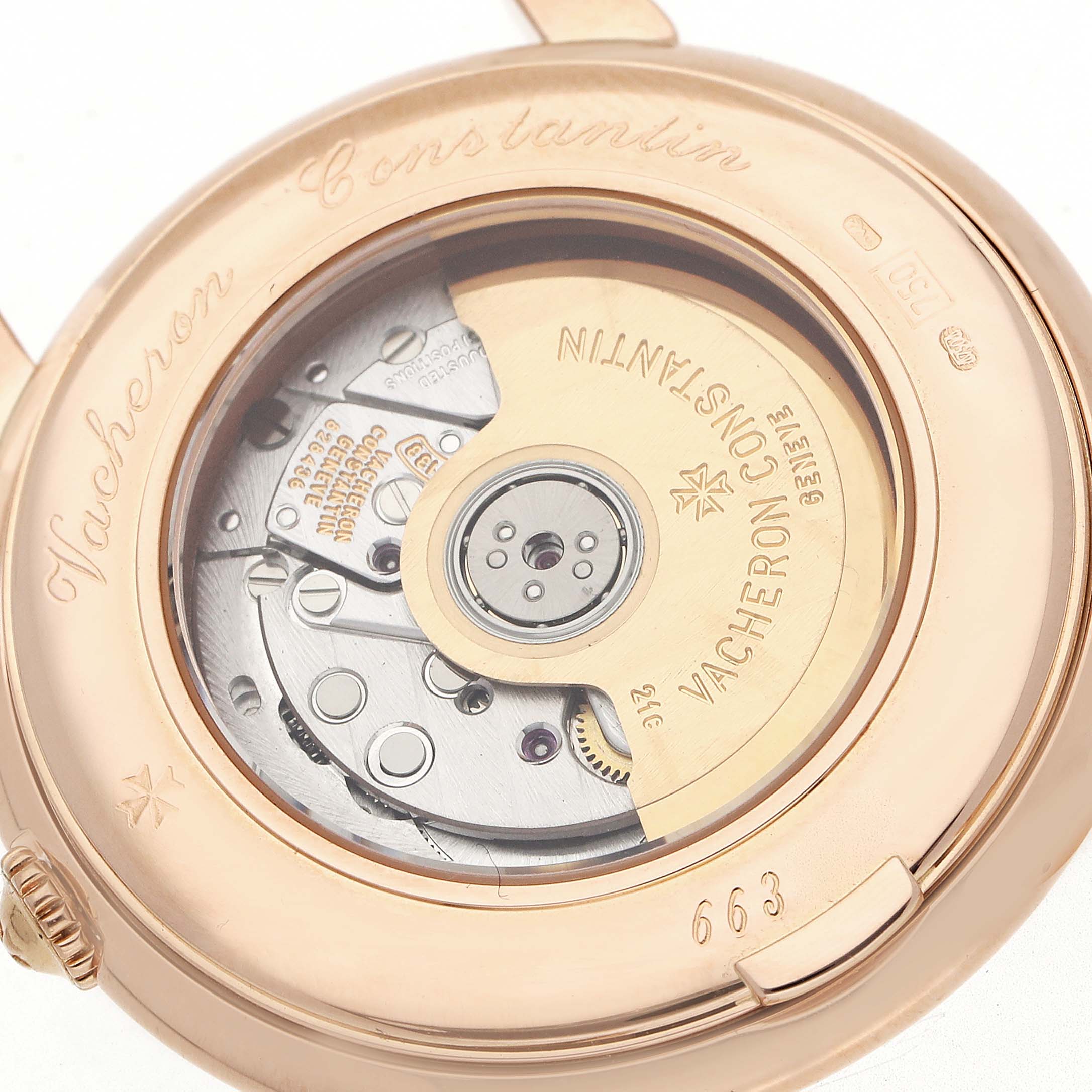 The image shows the back of the Vacheron Constantin Historiques 48001R Men's Rose Gold White Dial watch, highlighting its intricate movement and rotor.