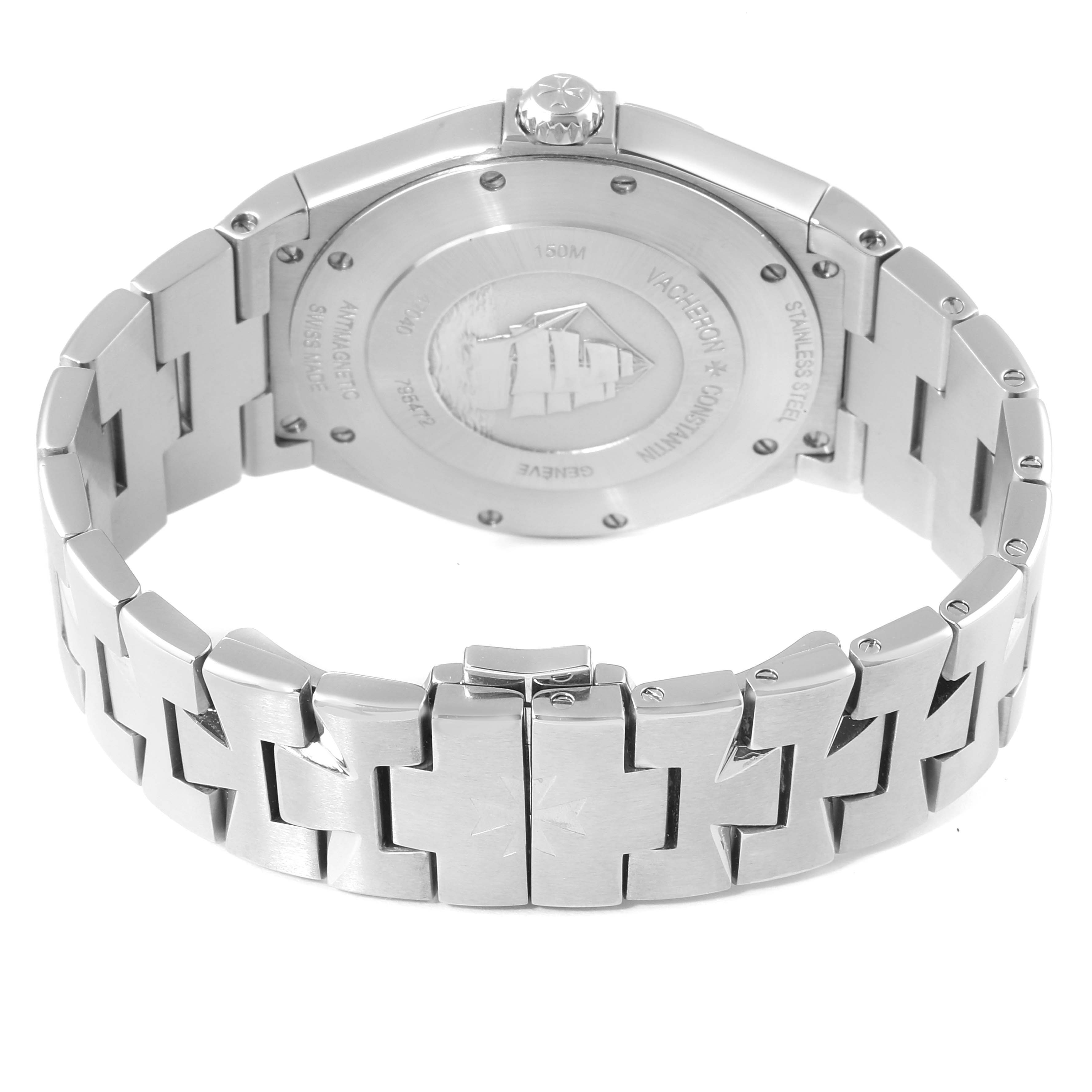 The image shows the back and bracelet of a Vacheron Constantin Overseas 47040B01A-9093 Men's Stainless Steel Silver Dial 47040B01A-9093 Men's Stainless Steel Silver Dial watch, displaying its case back and metal link design.