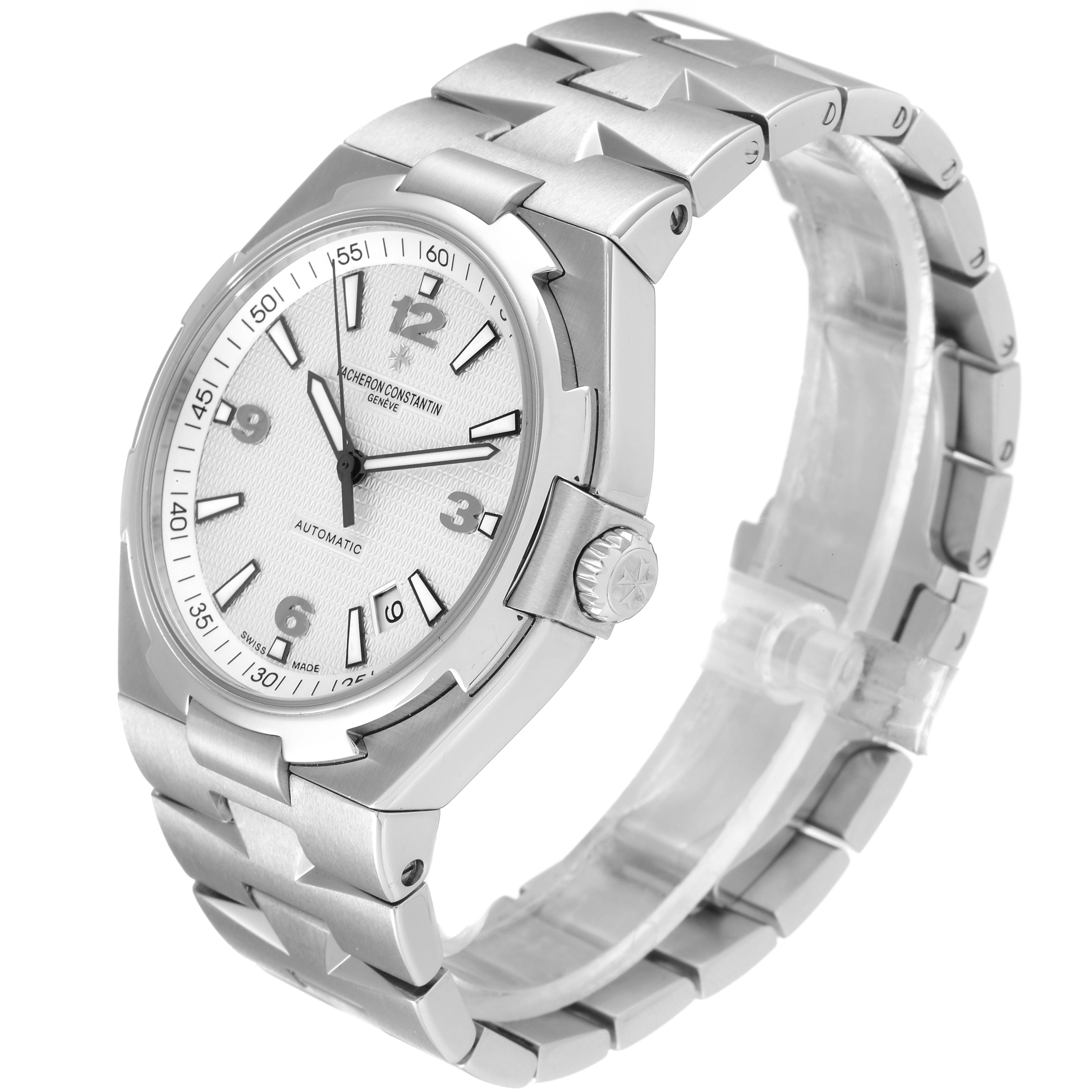 The Vacheron Constantin Overseas 47040B01A-9093 Men's Stainless Steel Silver Dial 47040B01A-9093 Men's Stainless Steel Silver Dial watch is shown at an angle displaying the face, crown, and part of the bracelet.