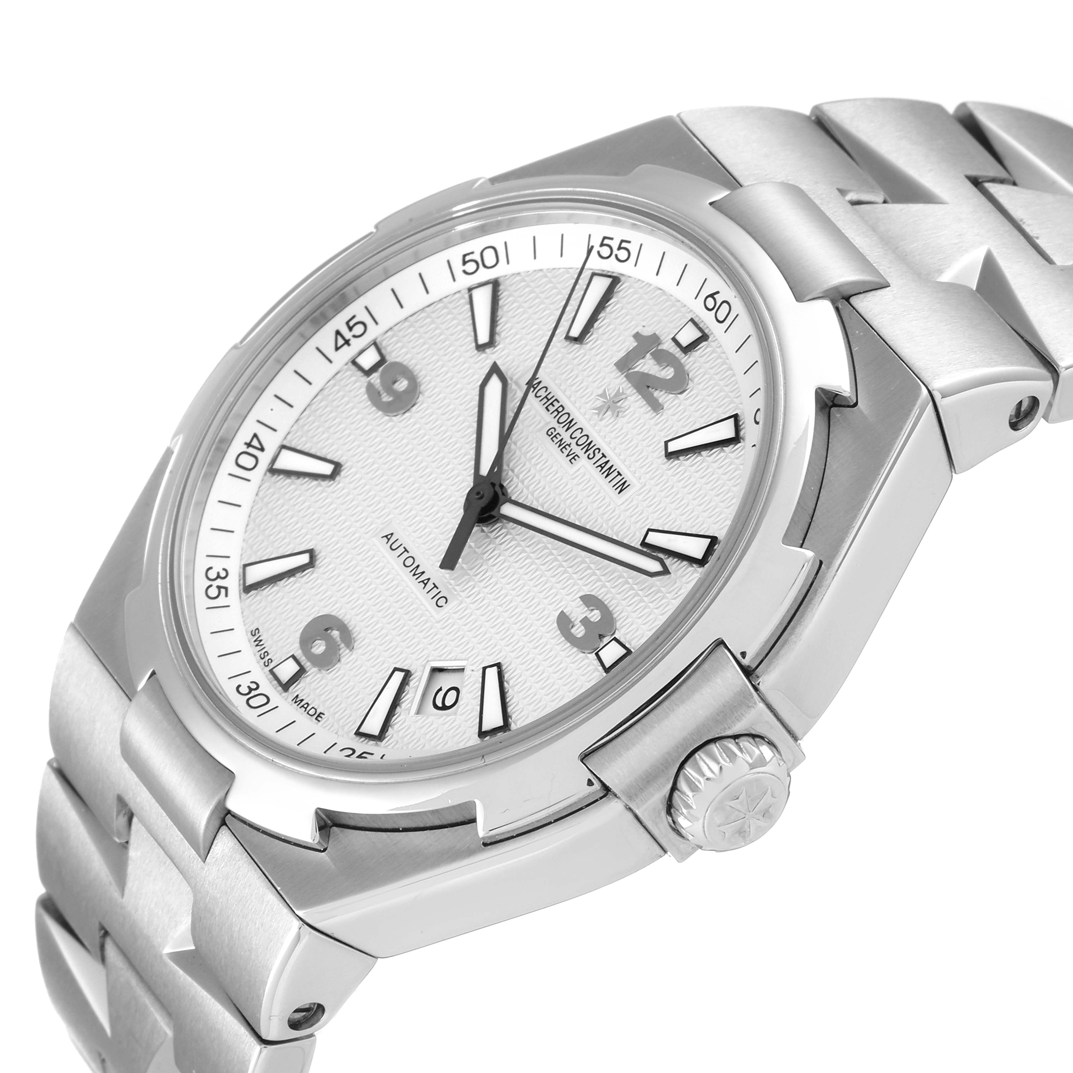 The image shows a Vacheron Constantin Overseas 47040B01A-9093 Men's Stainless Steel Silver Dial 47040B01A-9093 Men's Stainless Steel Silver Dial watch at a slight angle, displaying the crown, dial, and part of the bracelet.