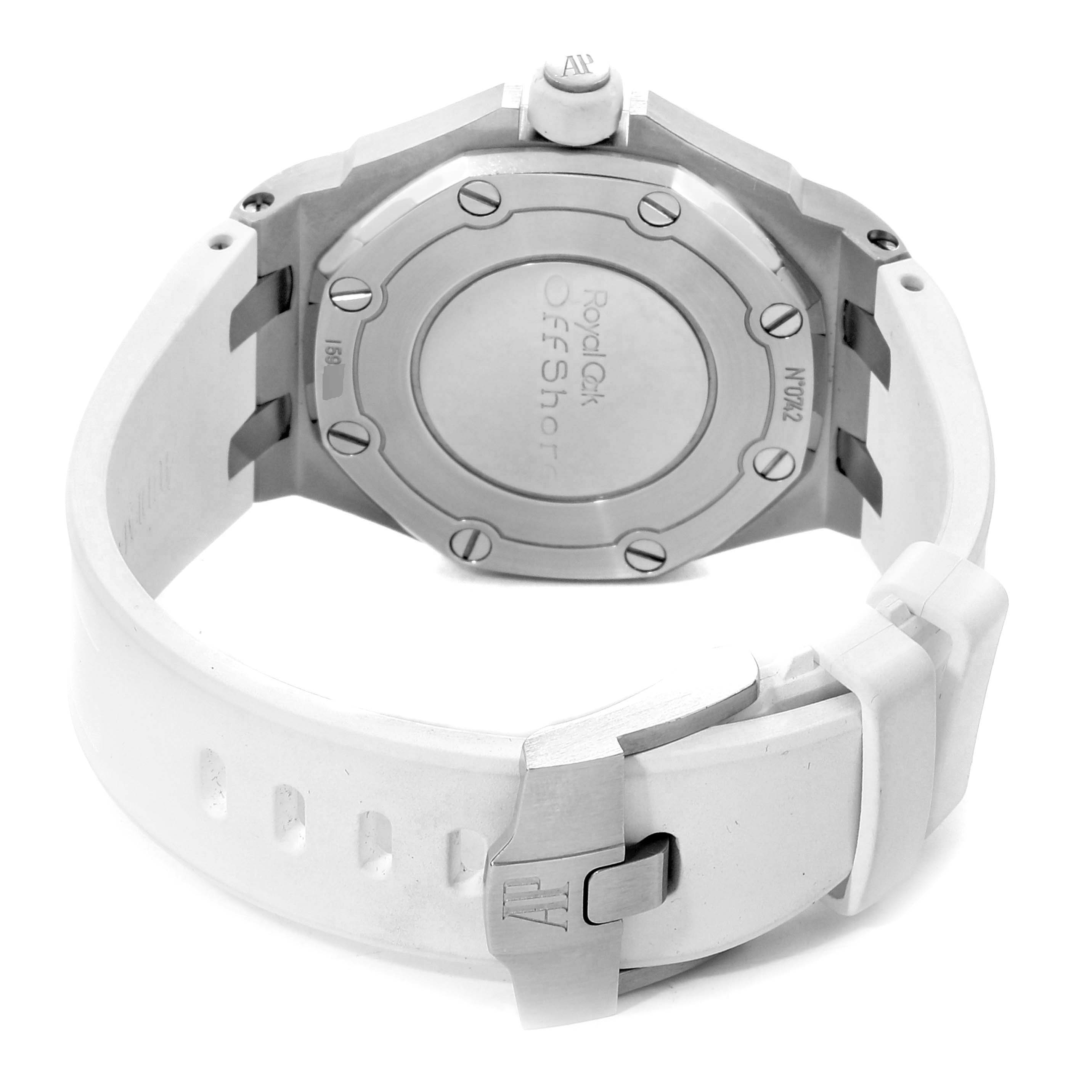 The image shows the back case and clasp of a Royal Oak Offshore watch by Audemars Piguet, featuring a white rubber strap.