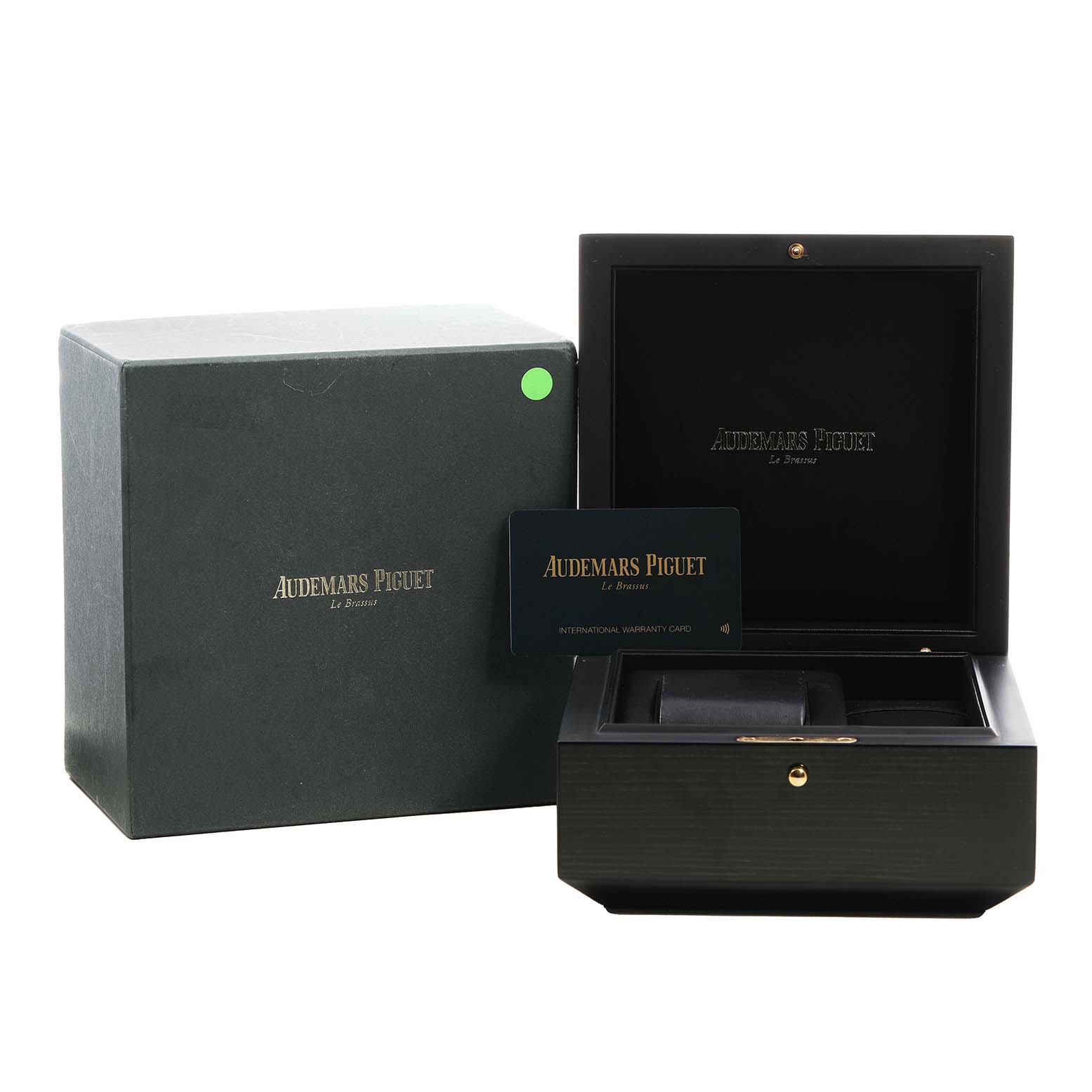 The image shows the packaging and accessories for an Audemars Piguet Royal Oak Offshore 26231ST.ZZ.D027CA.01 Women's Stainless Steel Blue Dial, including the box and warranty card.