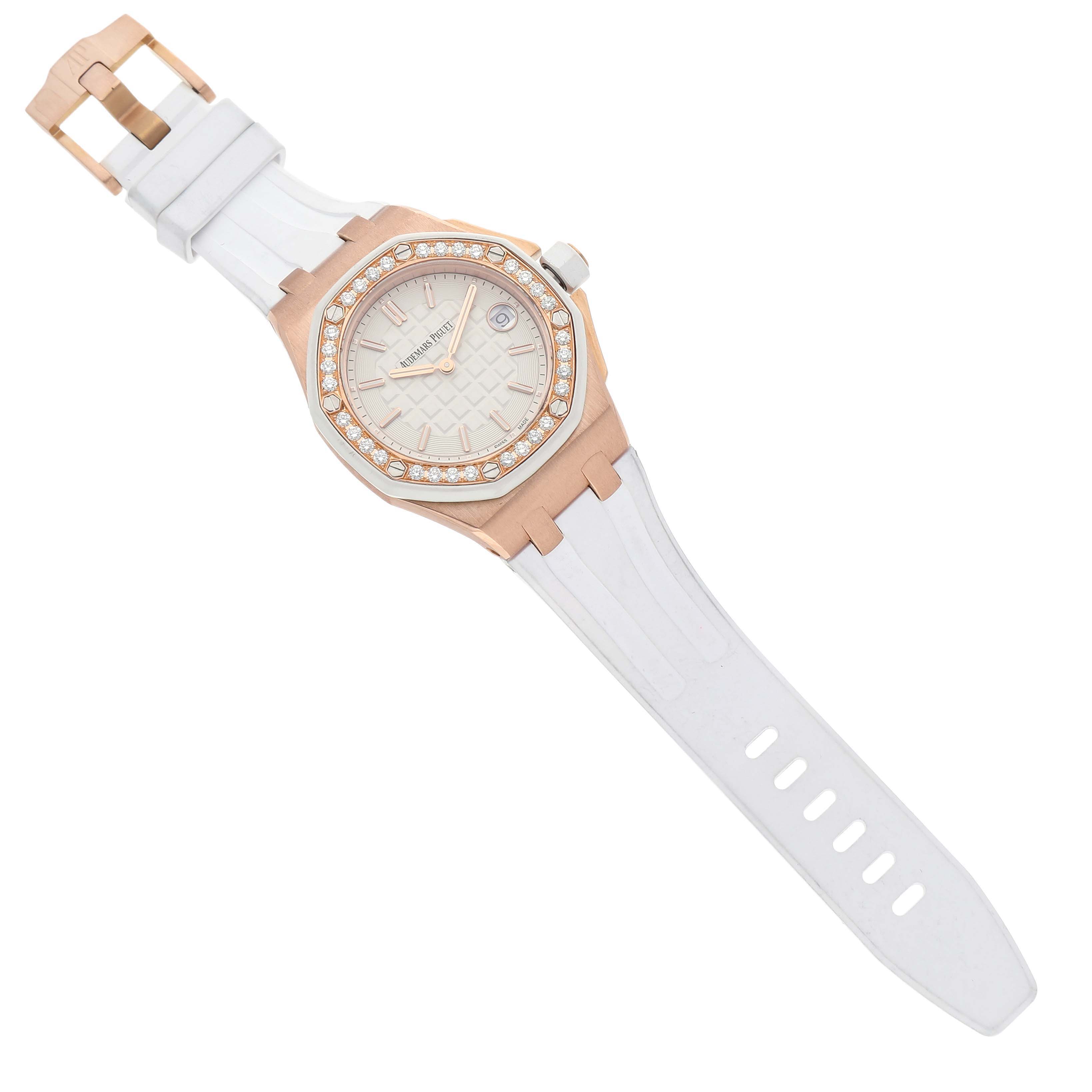 The Audemars Piguet Royal Oak Offshore 67540OK.ZZ.A010CA.01 Women's Rose Gold Silver Dial watch is shown at a slight angle, displaying the dial, bezel, and white strap.