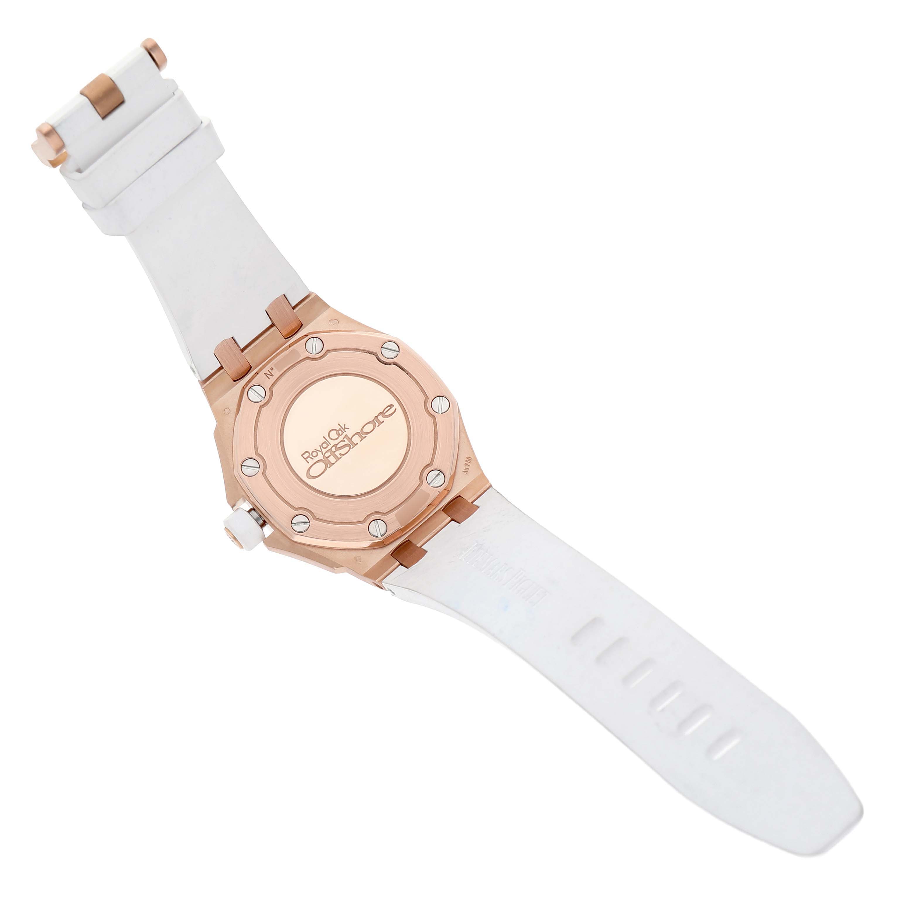 The Audemars Piguet Royal Oak Offshore 67540OK.ZZ.A010CA.01 Women's Rose Gold Silver Dial watch is shown from the back, highlighting the case back and white strap.