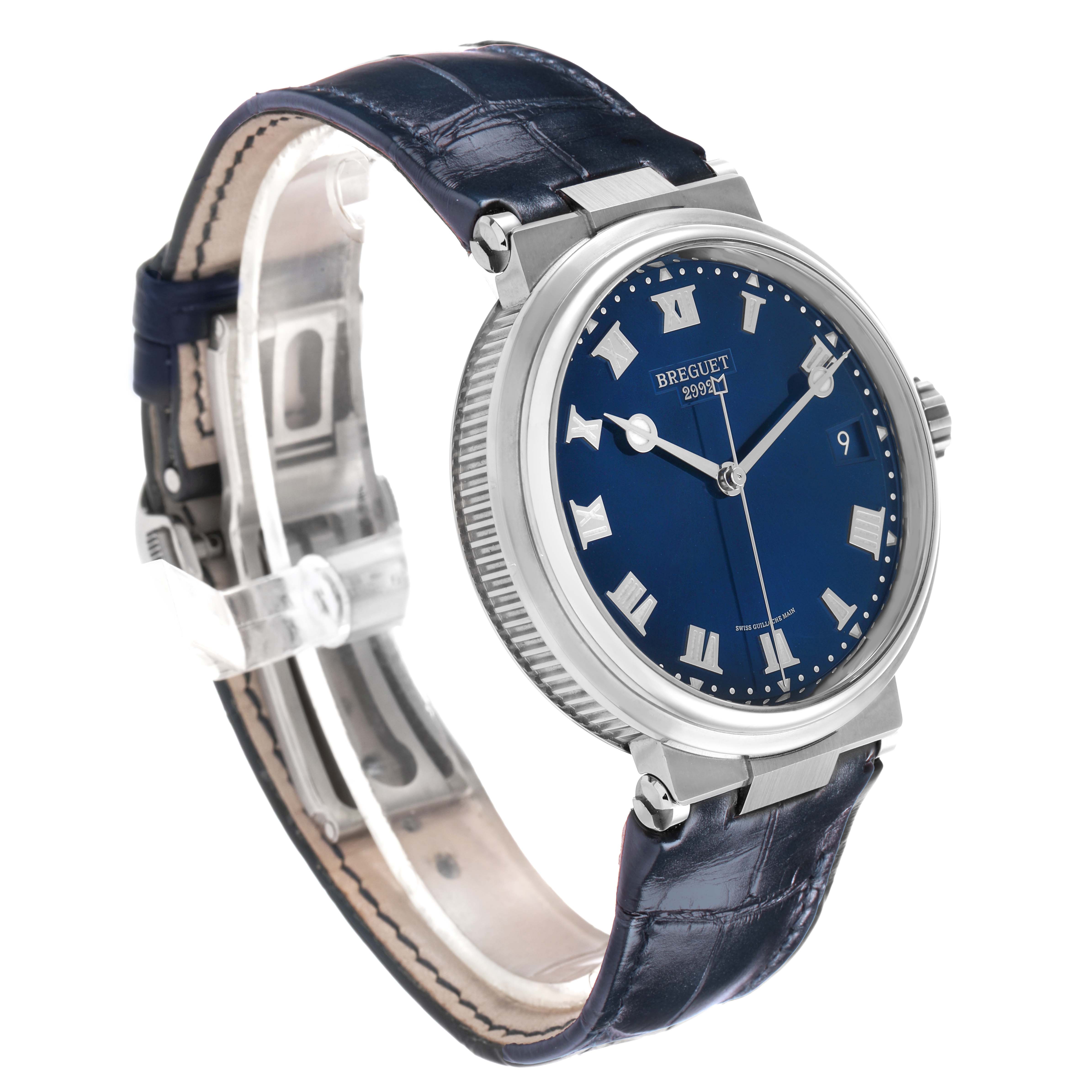 The Breguet Marine 5517TI/Y1/TZ0 Men's Titanium Blue Dial watch is shown at a three-quarter angle, highlighting its blue dial, Roman numerals, and leather strap.