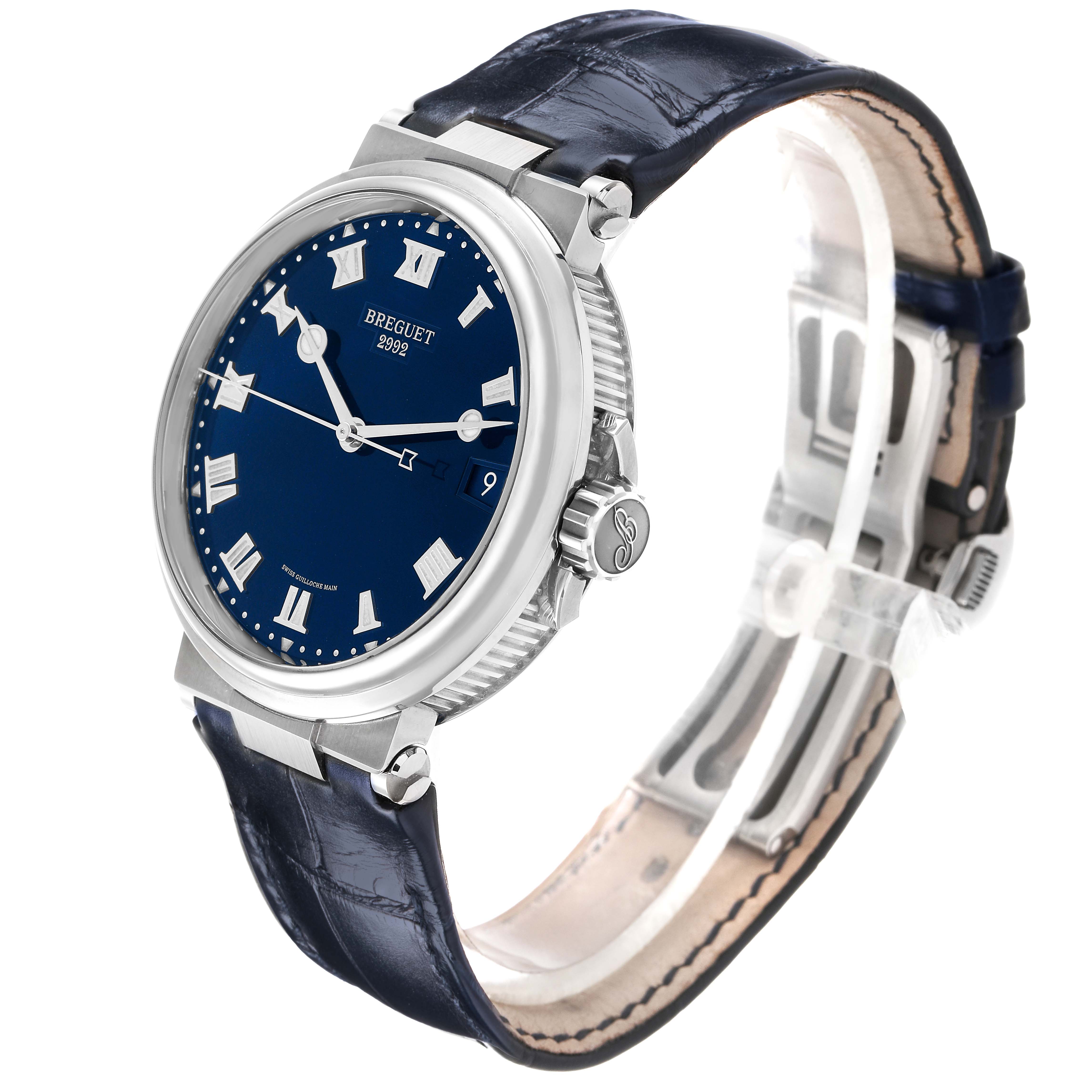 The Breguet Marine 5517TI/Y1/TZ0 Men's Titanium Blue Dial watch is shown from a side angle, highlighting the case, dial, crown, and leather strap.