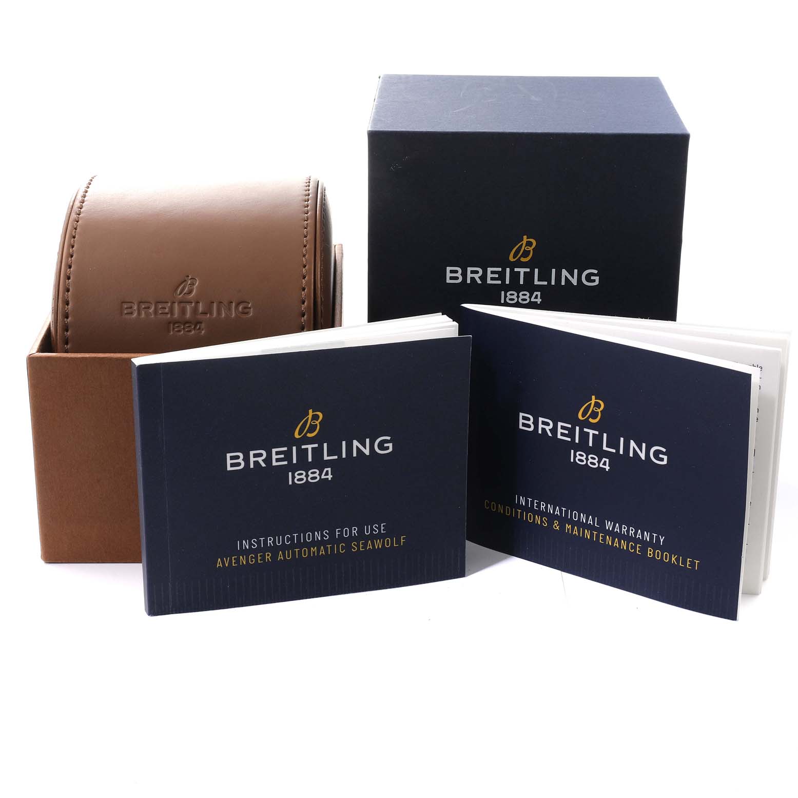 The image shows a Breitling Avenger A17319 Men's Stainless Steel Yellow Dial A17319 Men's Stainless Steel Yellow Dial watch box, a leather case, and instruction and warranty booklets.