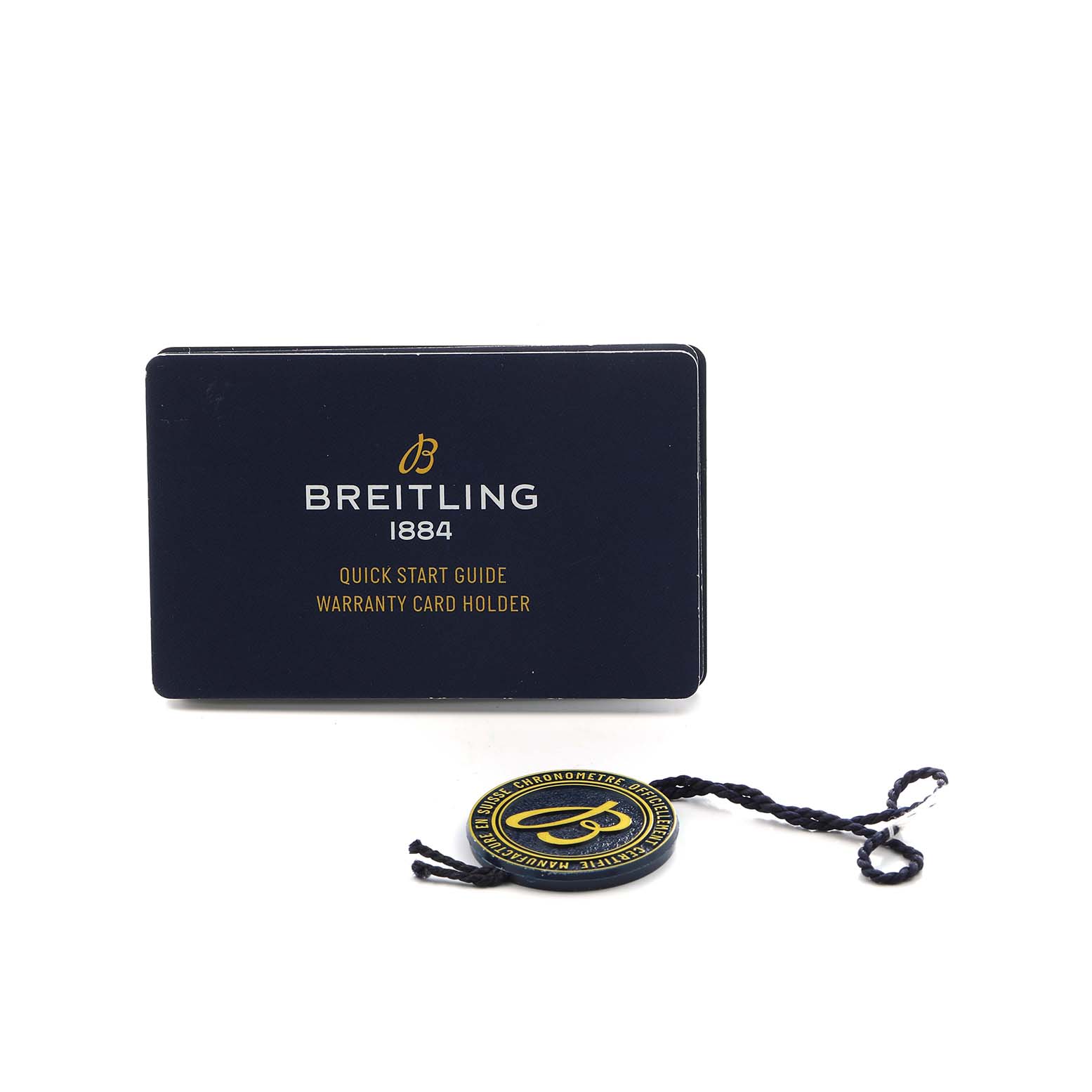 The image shows the Breitling Premier AB1510 Men's Stainless Steel Blue Dial model's Quick Start Guide with a warranty card holder and a branded tag.