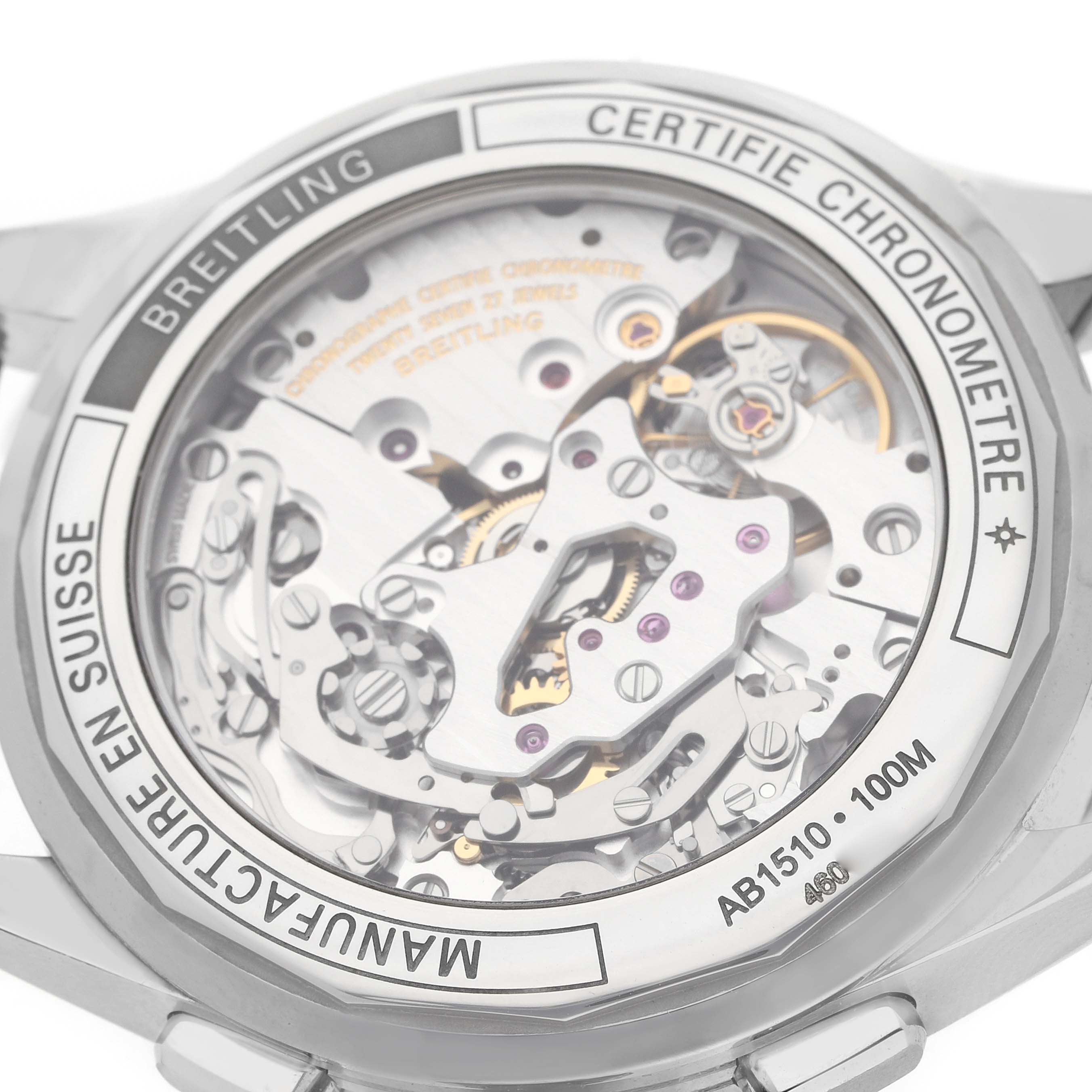 The image shows the back of the Breitling Premier AB1510 Men's Stainless Steel Blue Dial watch, highlighting its inner mechanical movement.