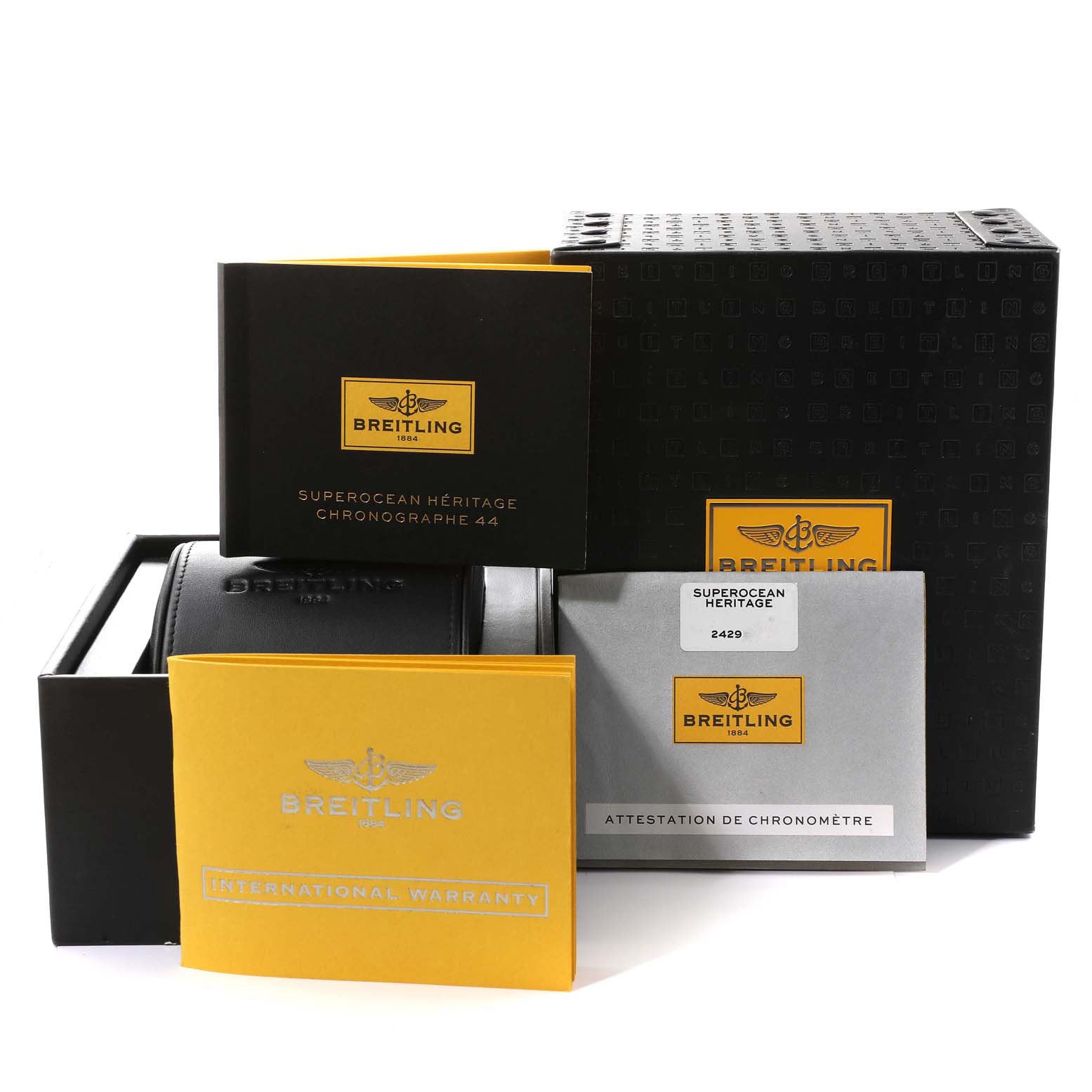 The image shows the box, warranty cards, and documentation for the Breitling Superocean A23370 Men
s Stainless Steel Silver Dial A23370 Men
s Stainless Steel Silver Dial model, viewed at a slight angle.